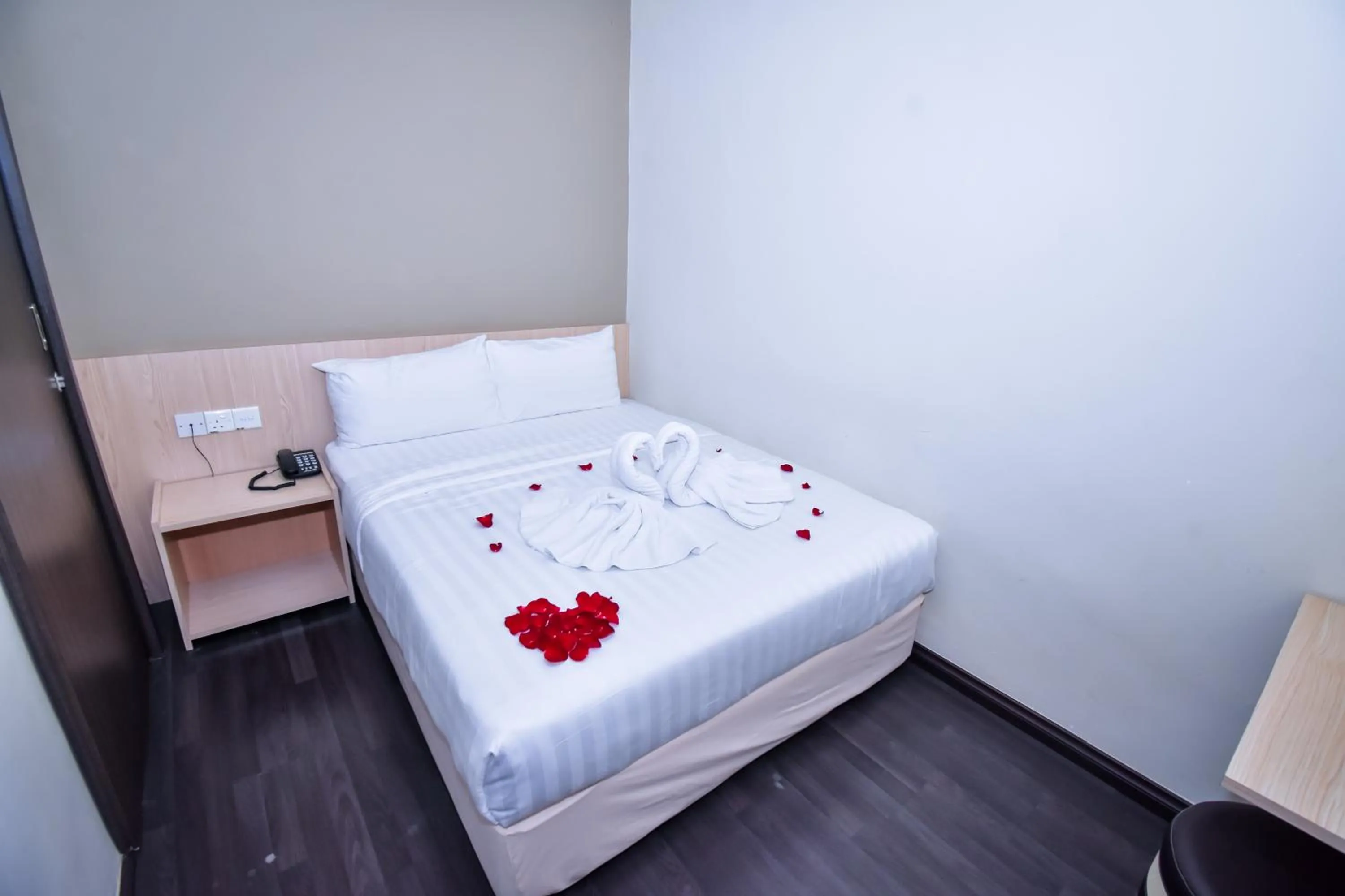 Bed in Eden Boutique Hotel