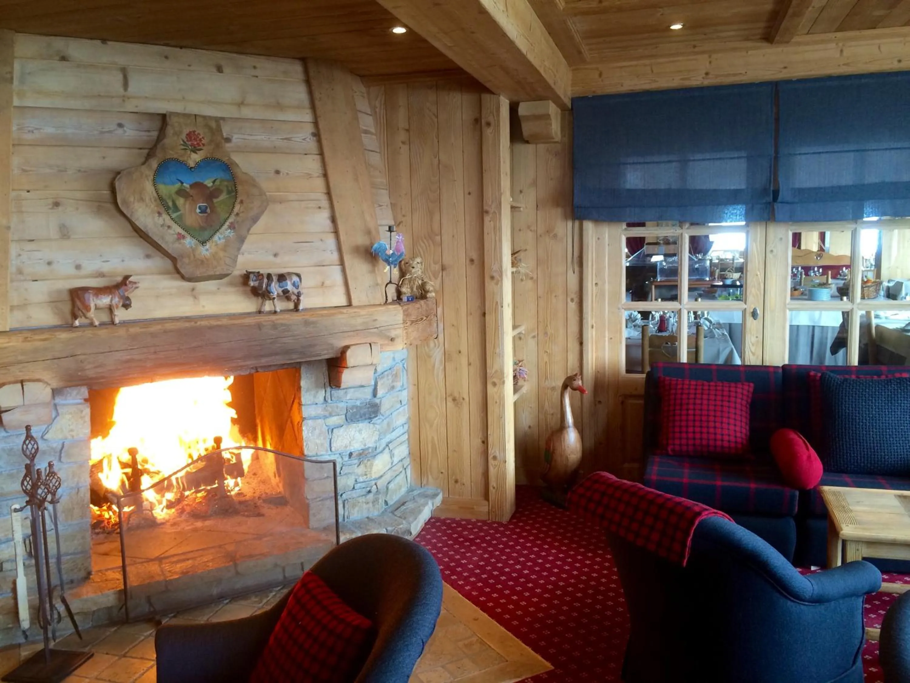 Communal lounge/ TV room in Aux Ducs de Savoie