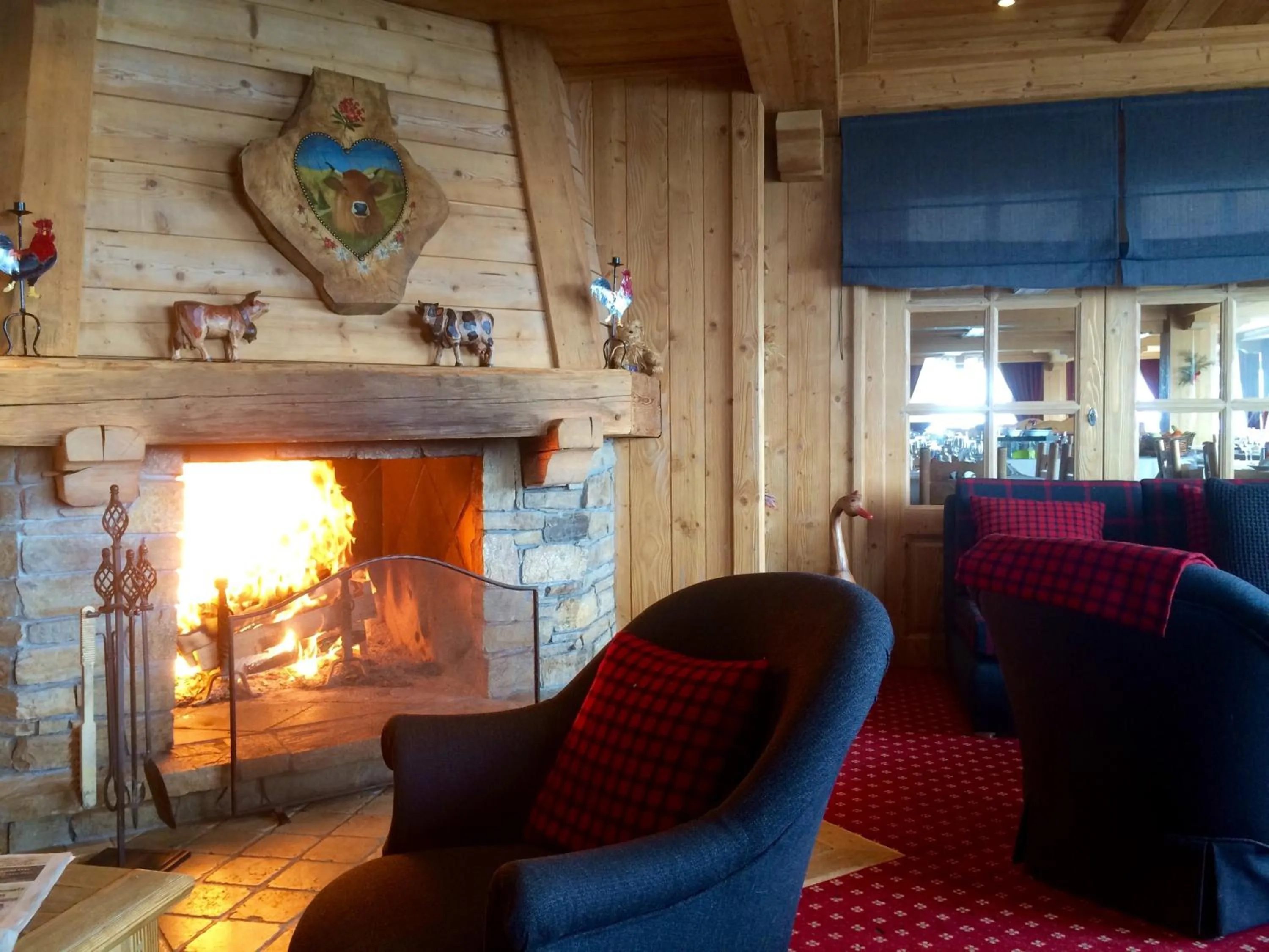 Communal lounge/ TV room in Aux Ducs de Savoie