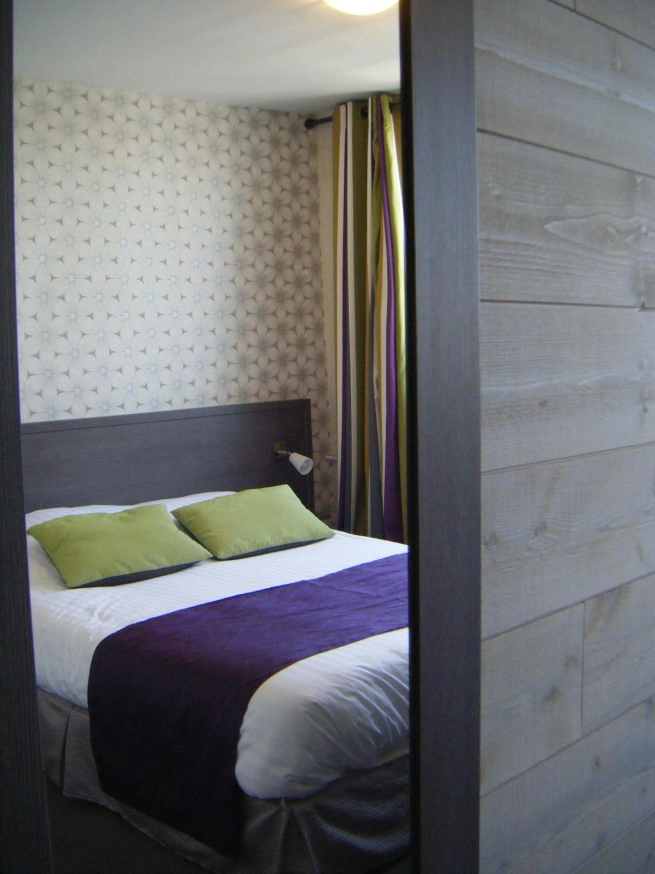 Photo of the whole room, Bed in Logis - Hôtel & Restaurant Le Bellevue