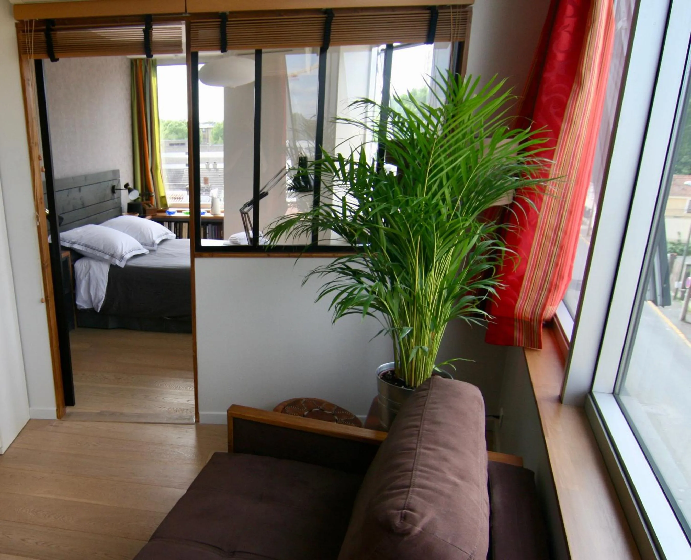 Seating area, Bed in bibou's room Paris