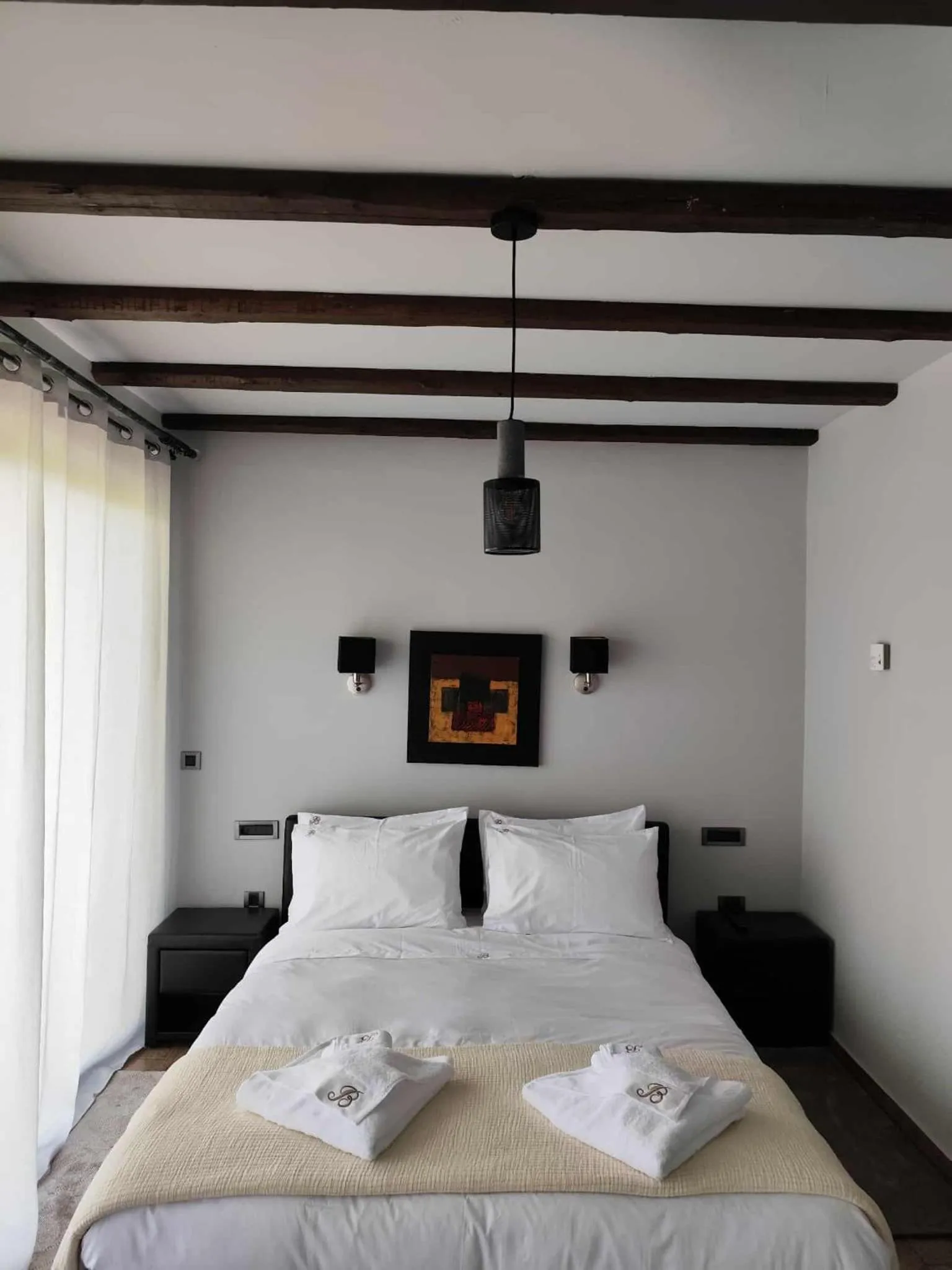 Bed in Vathyskia Guesthouse