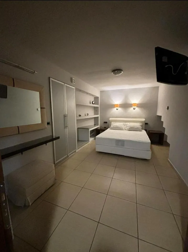 Bed in Vathyskia Guesthouse