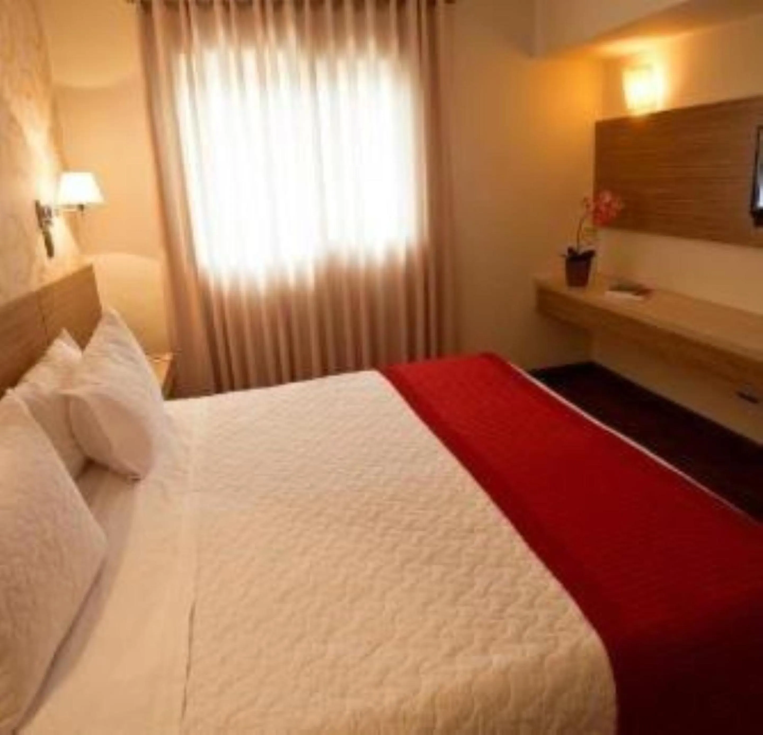 Bed in LS Villas Hotel & Spa