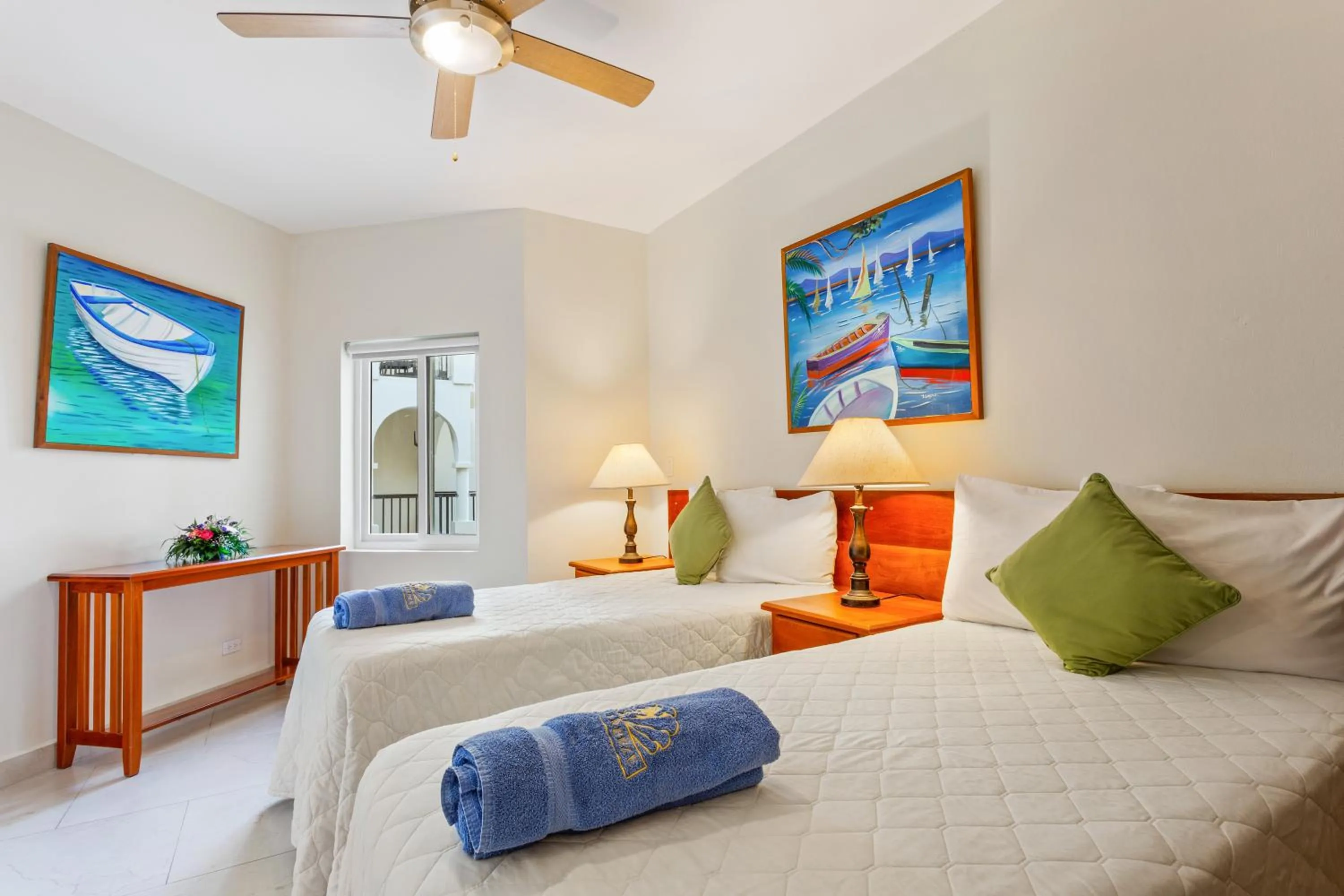 Bed in SunBreeze Suites