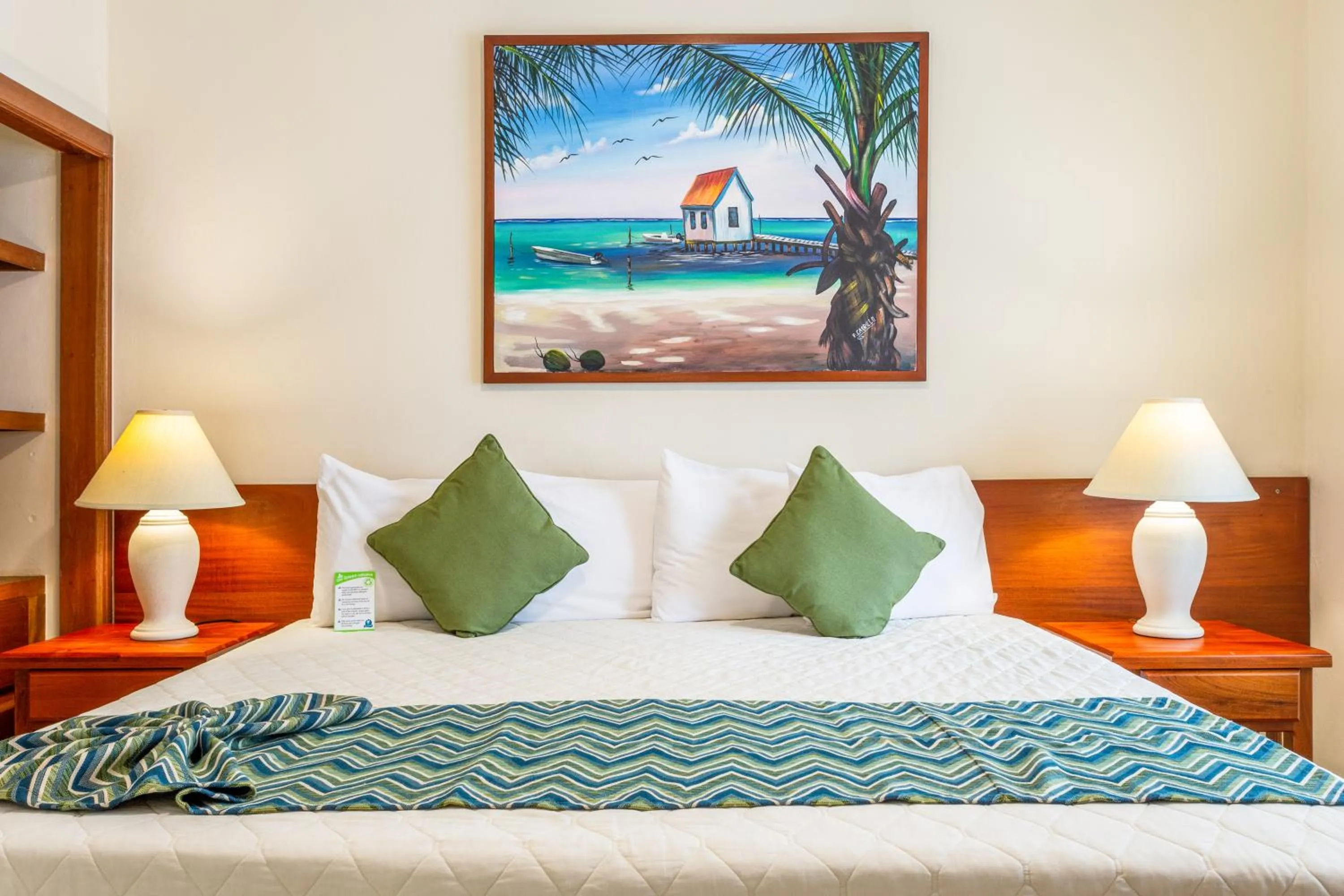 Bed in SunBreeze Suites