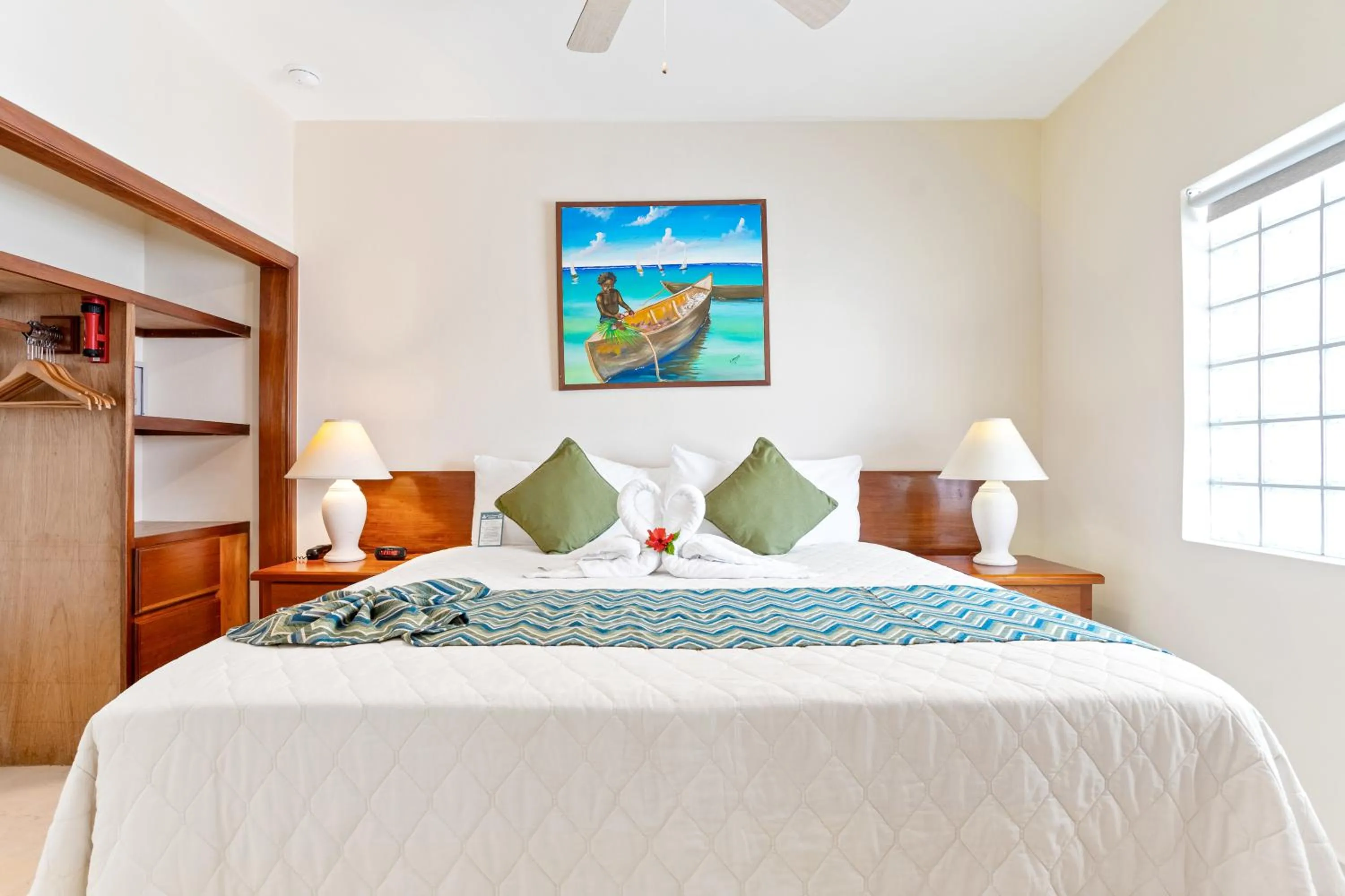 Bed in SunBreeze Suites