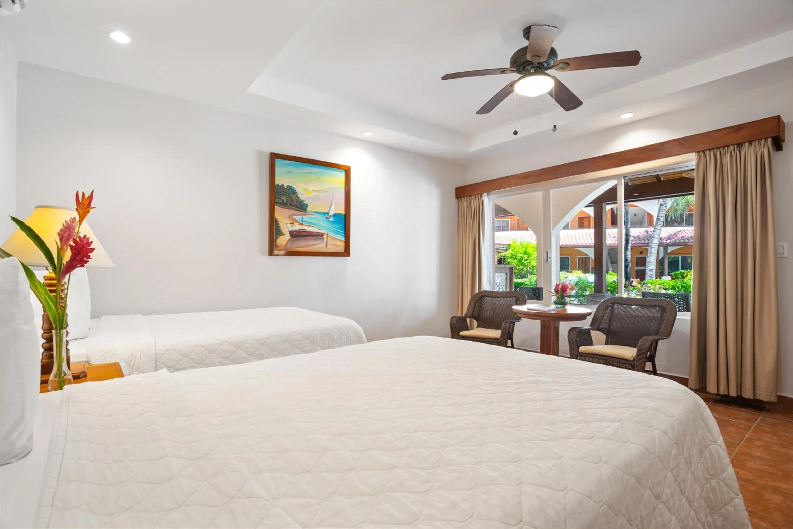 Bed in SunBreeze Hotel