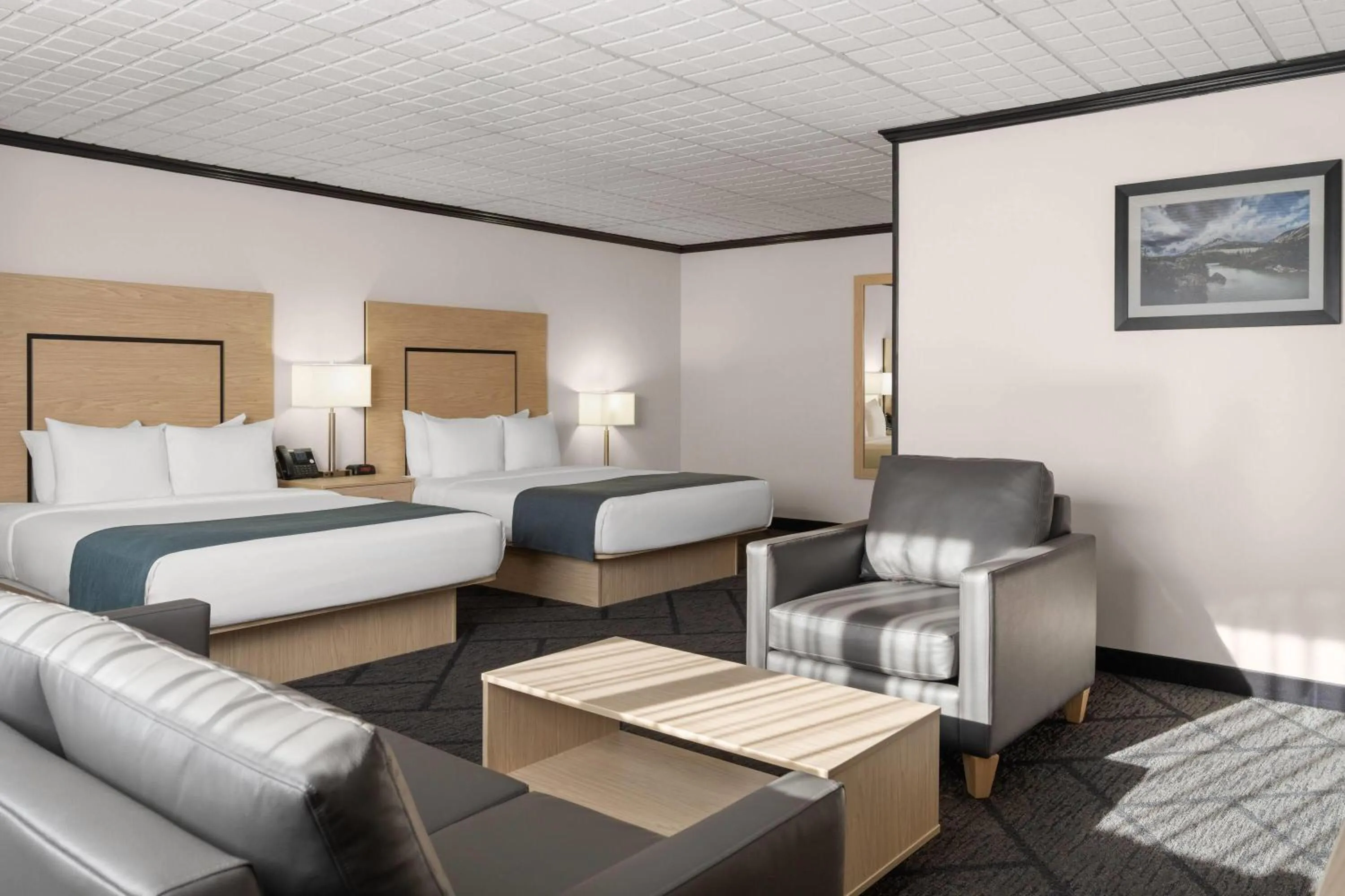 Photo of the whole room, Bed in Sternwheeler Hotel & Conference Centre, Trademark by Wyndham