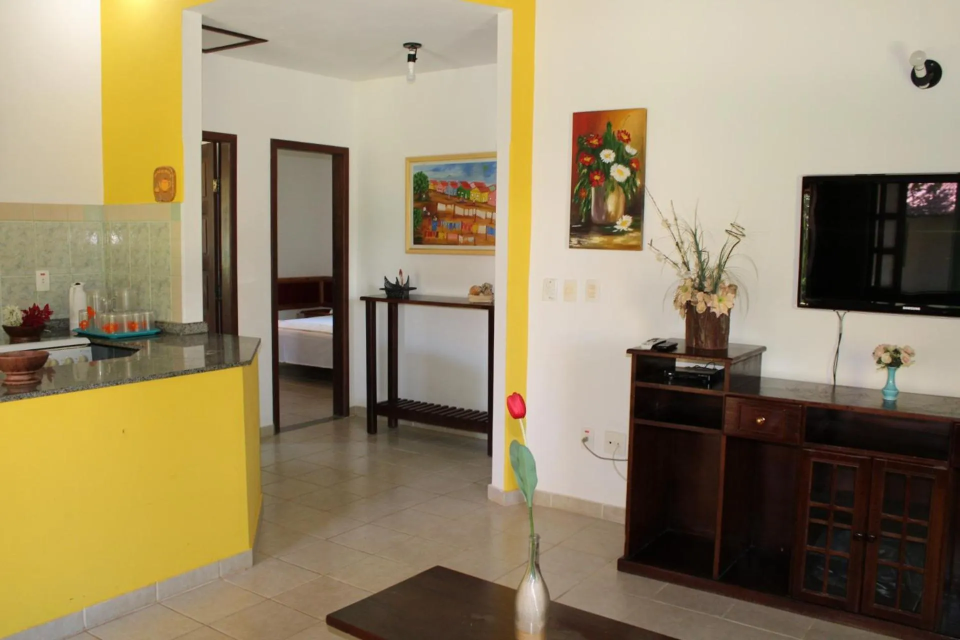 Communal lounge/ TV room in Hotel Residencial do Mirante