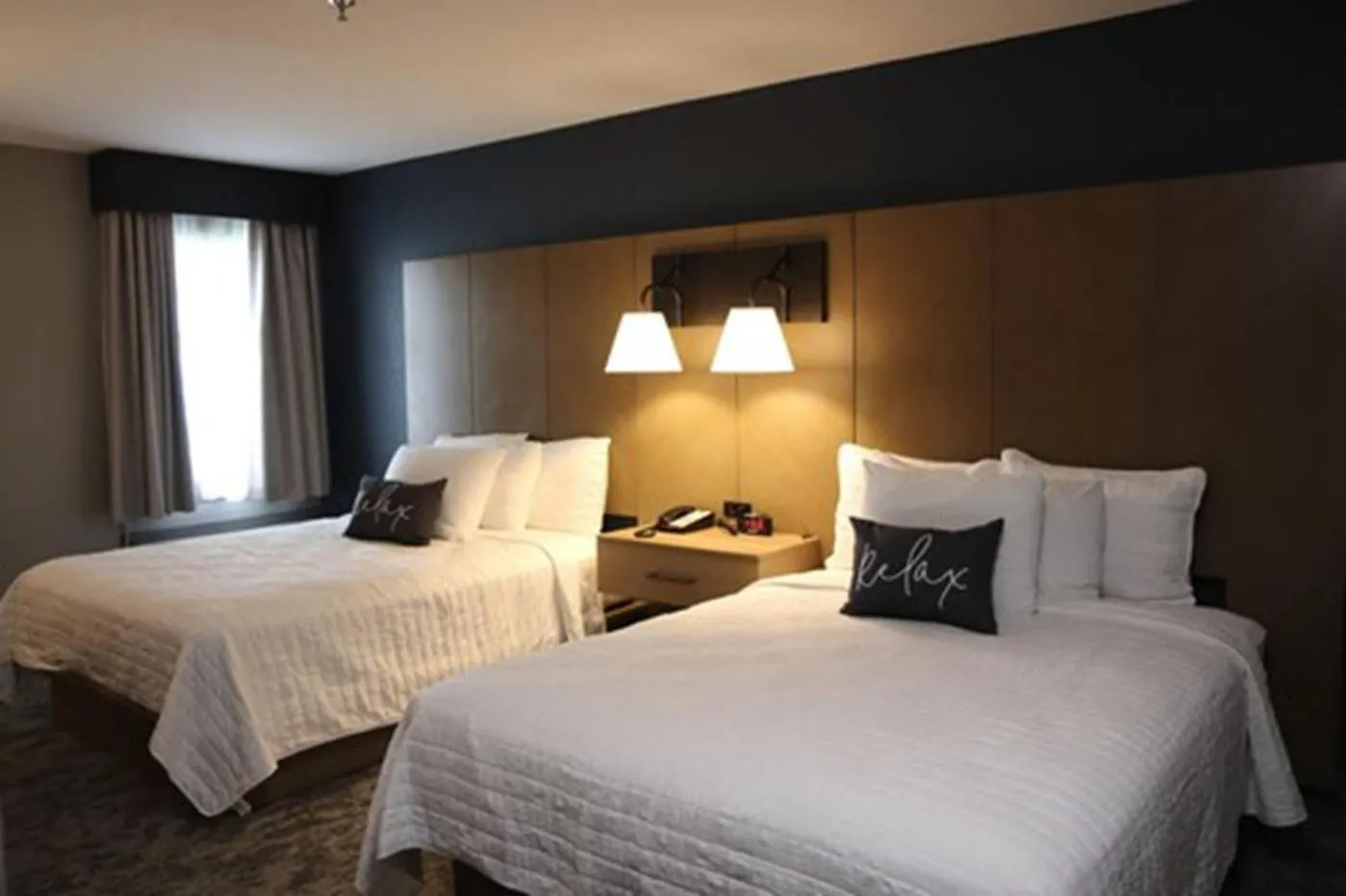 Bedroom, Bed in Eastland Suites Hotel & Conference Ctr, Trademark by Wyndham