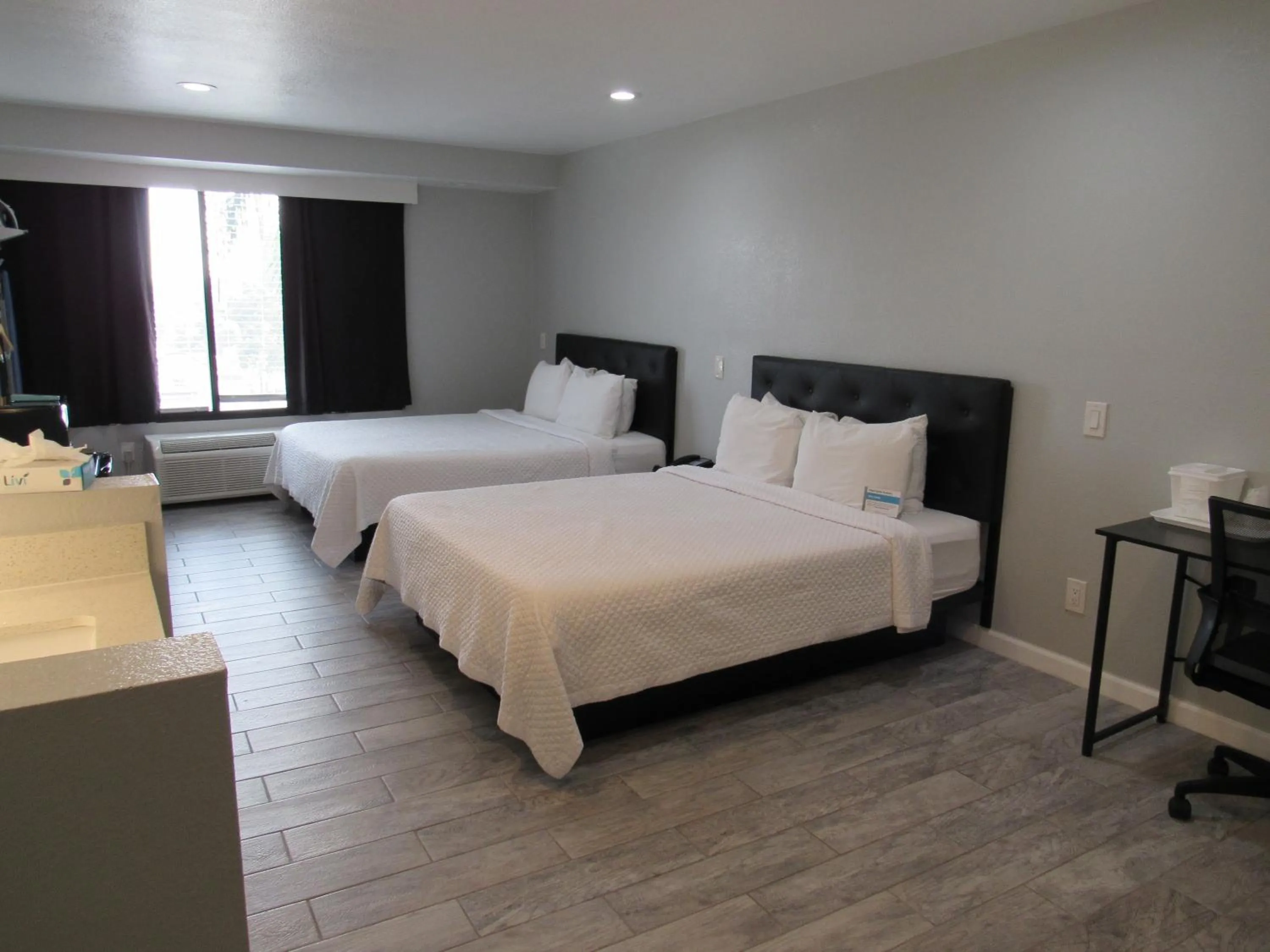 Bed in Capri Suites Anaheim