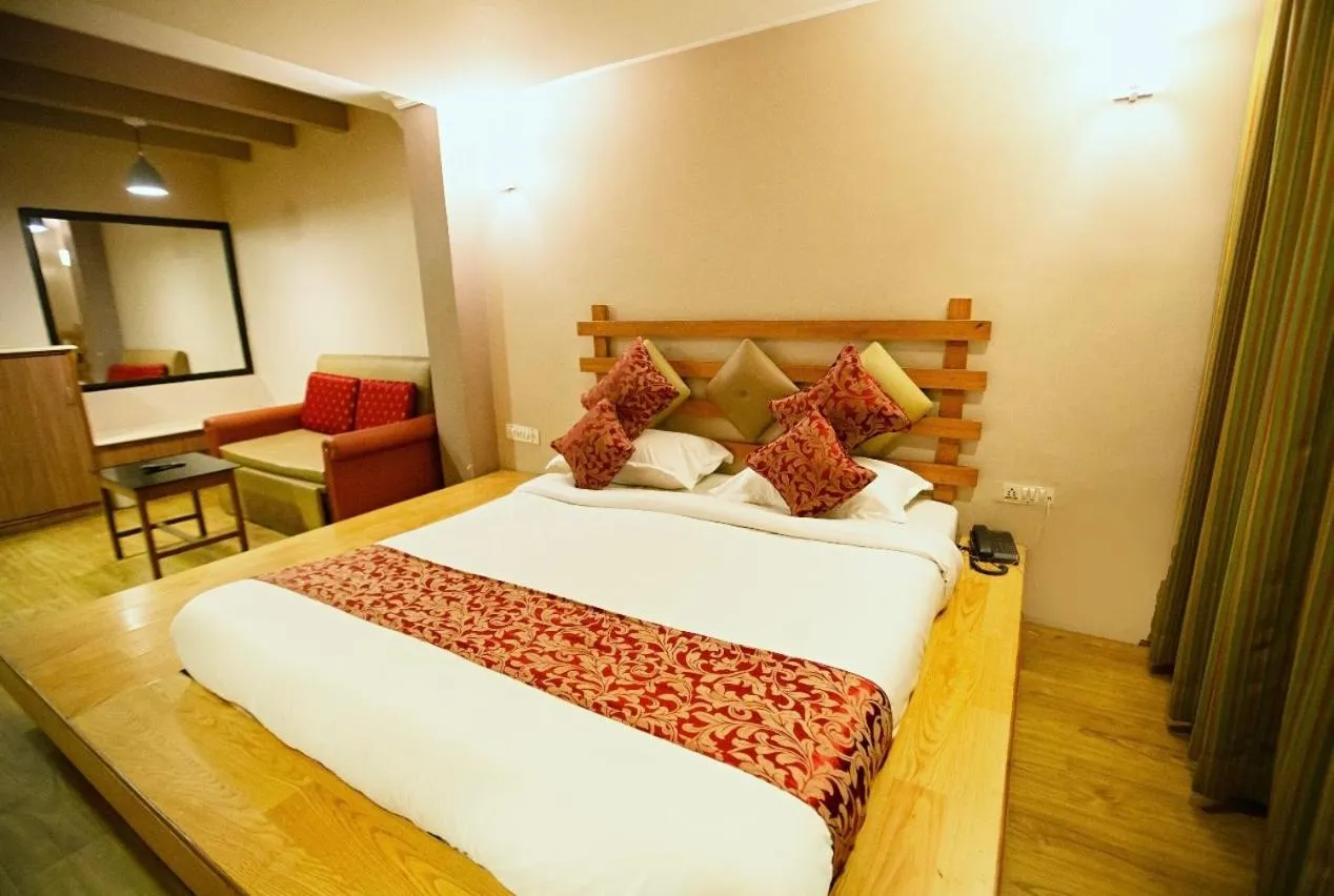 Bed in Hotel Maneck Residency