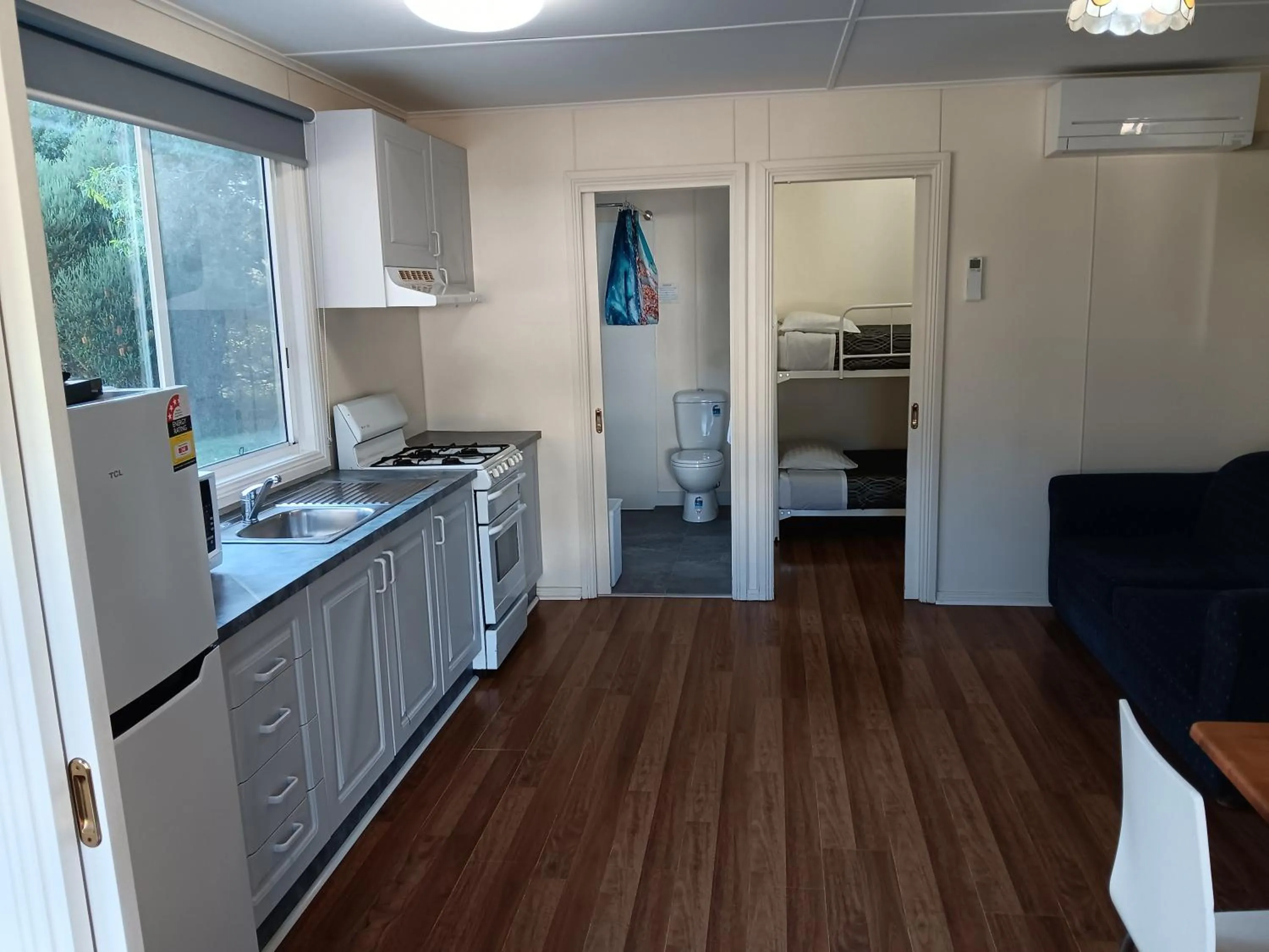 Living room in Mallacoota's Shady Gully Caravan Park