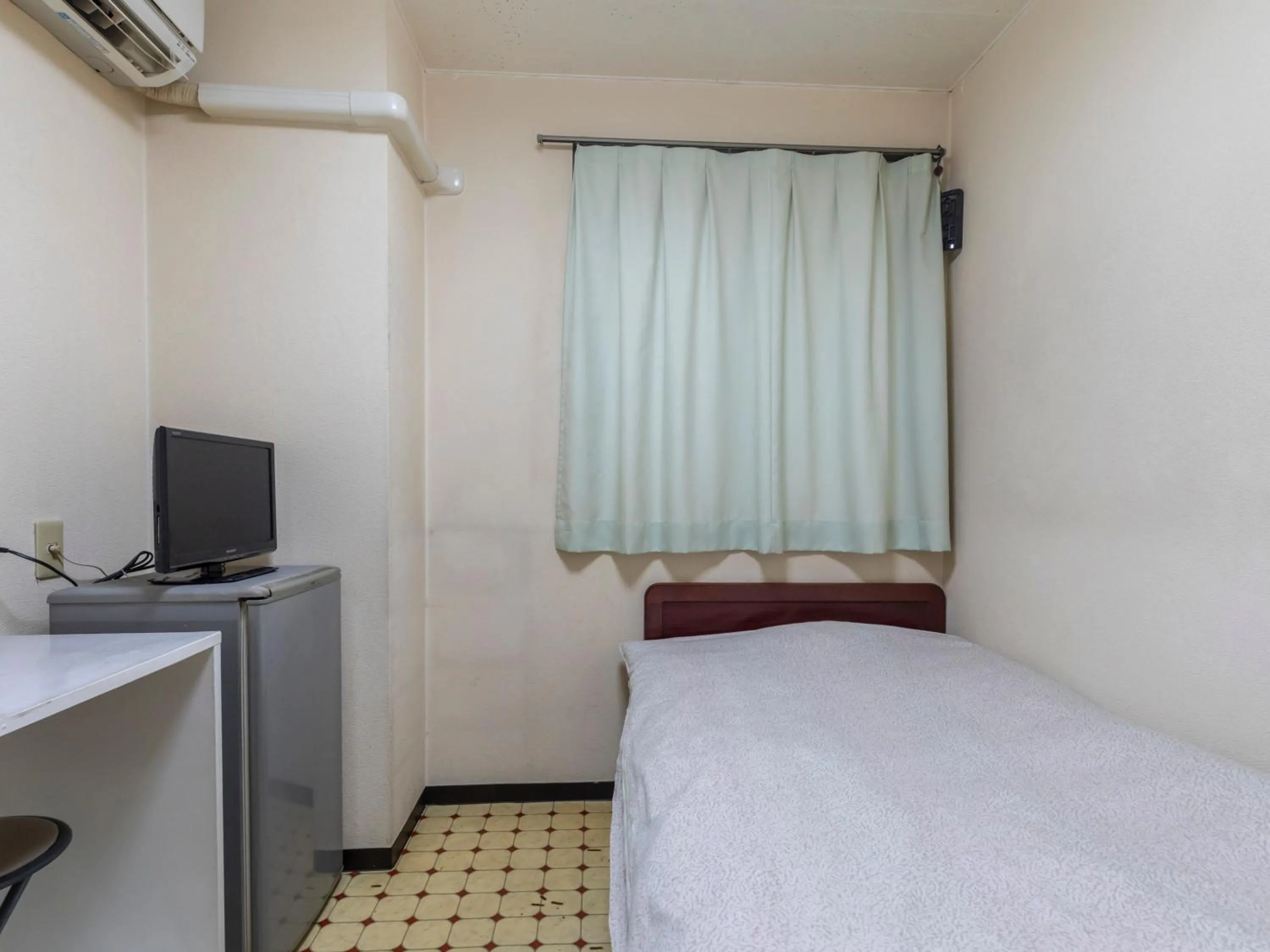 Photo of the whole room, Bed in Business Hotel Kaga