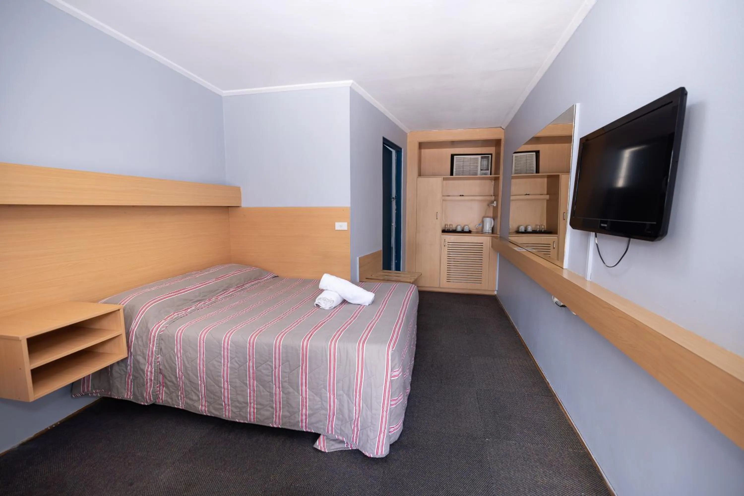 Bed in Windsor Heritage Motel