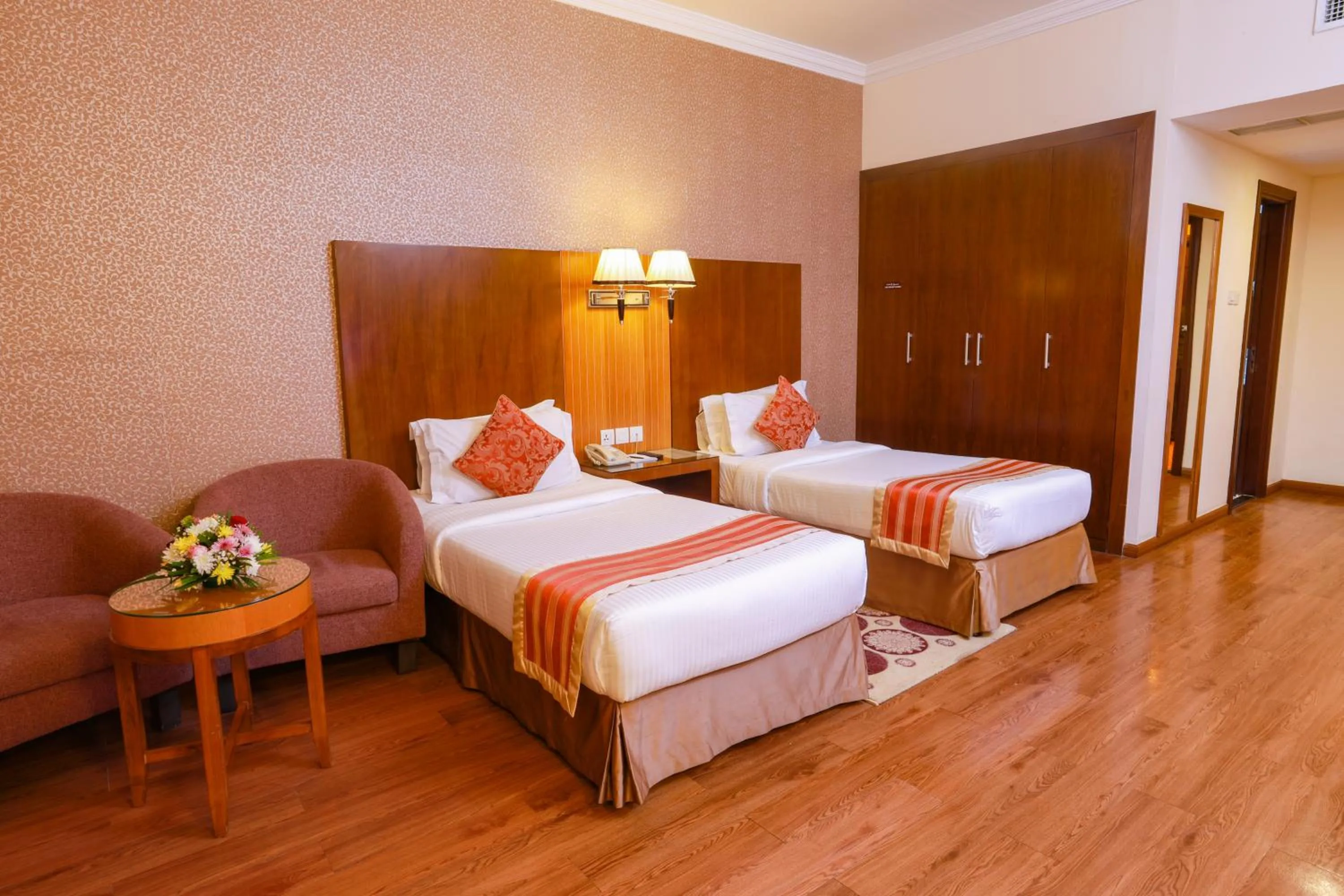 Bedroom, Bed in Fortune Pearl Hotel