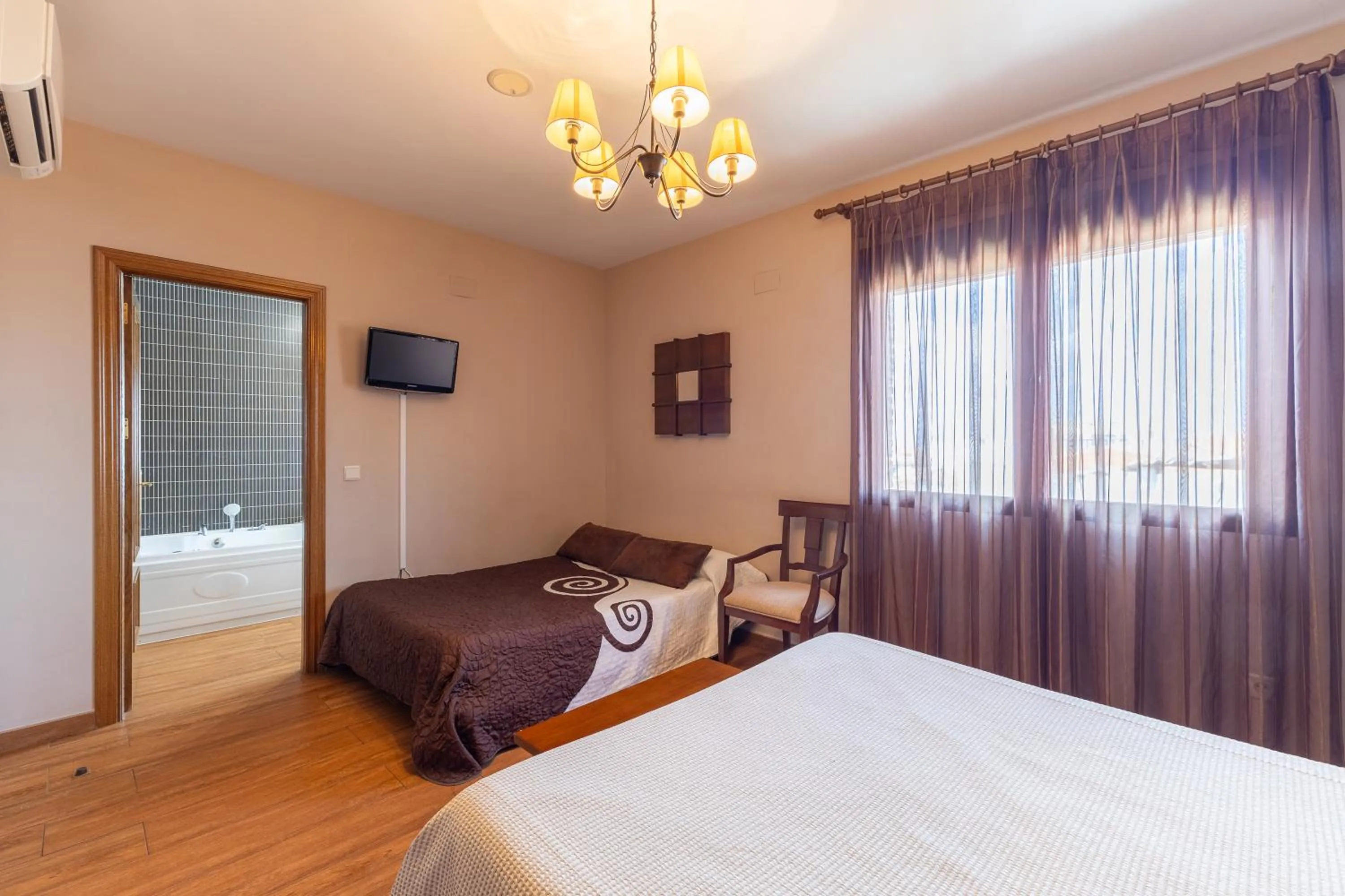 Bed in Alojamientos Callejón del Pozo, cerca Puy du Fou