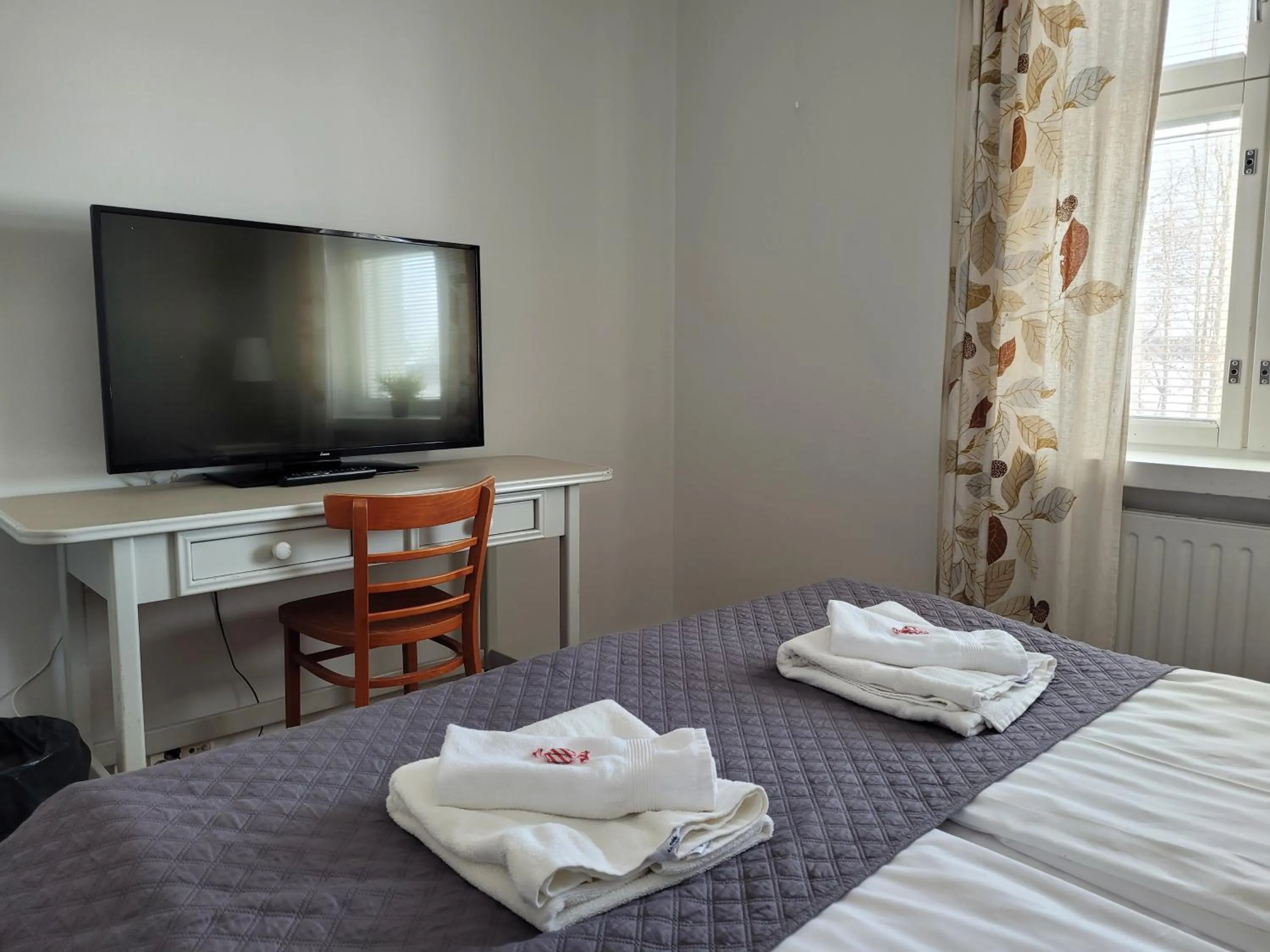 Bedroom, Bed in Kylpylähotelli Pohjanranta