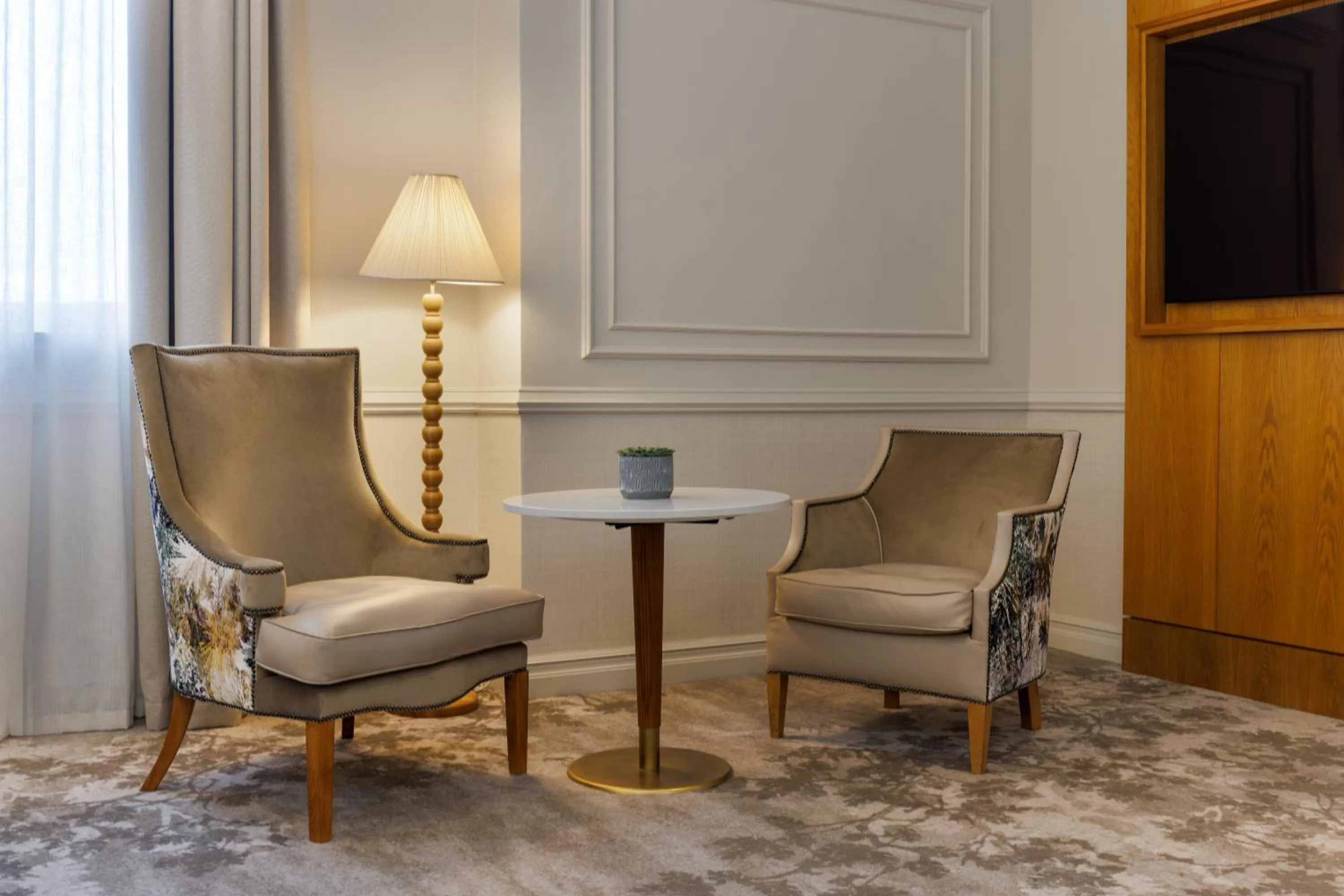 Seating area in The Caledonian Edinburgh, Curio Collection by Hilton