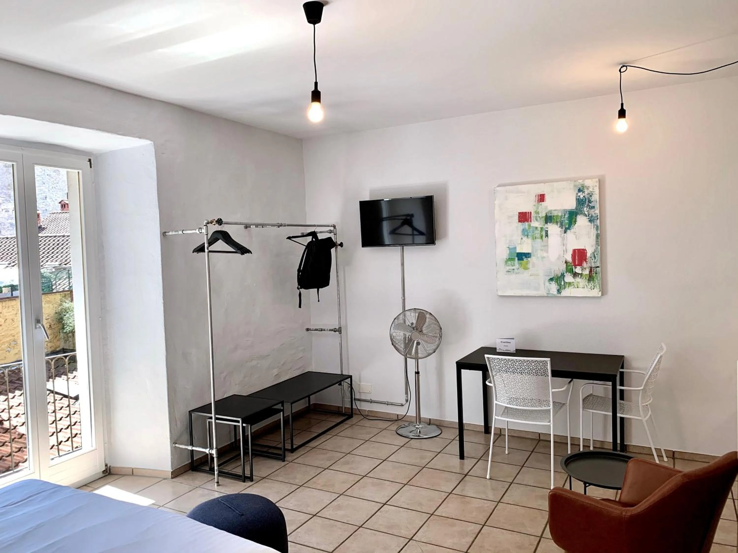 Living room in Great2Stay City Center Apartments Locarno