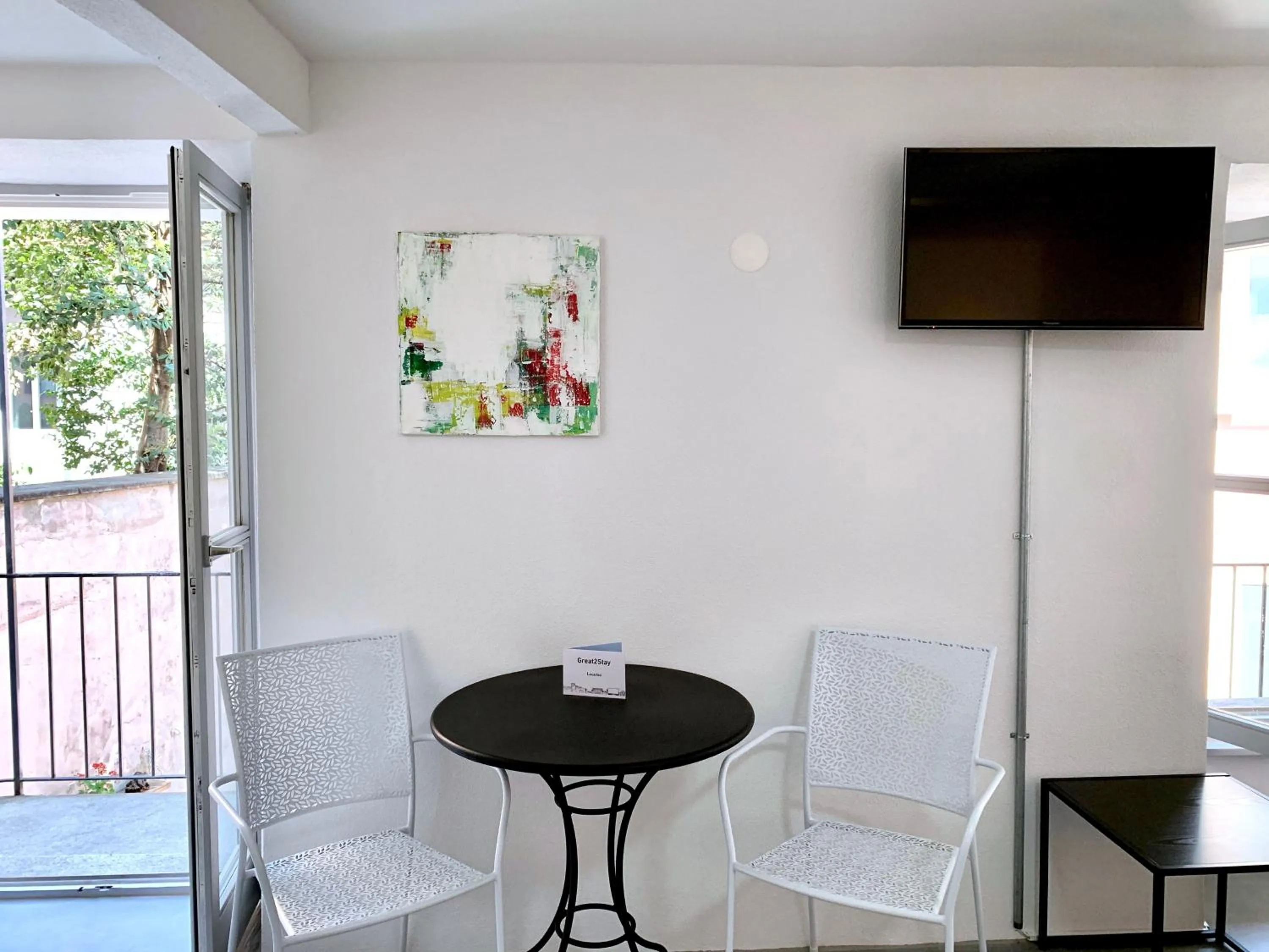 Dining area in Great2Stay City Center Apartments Locarno