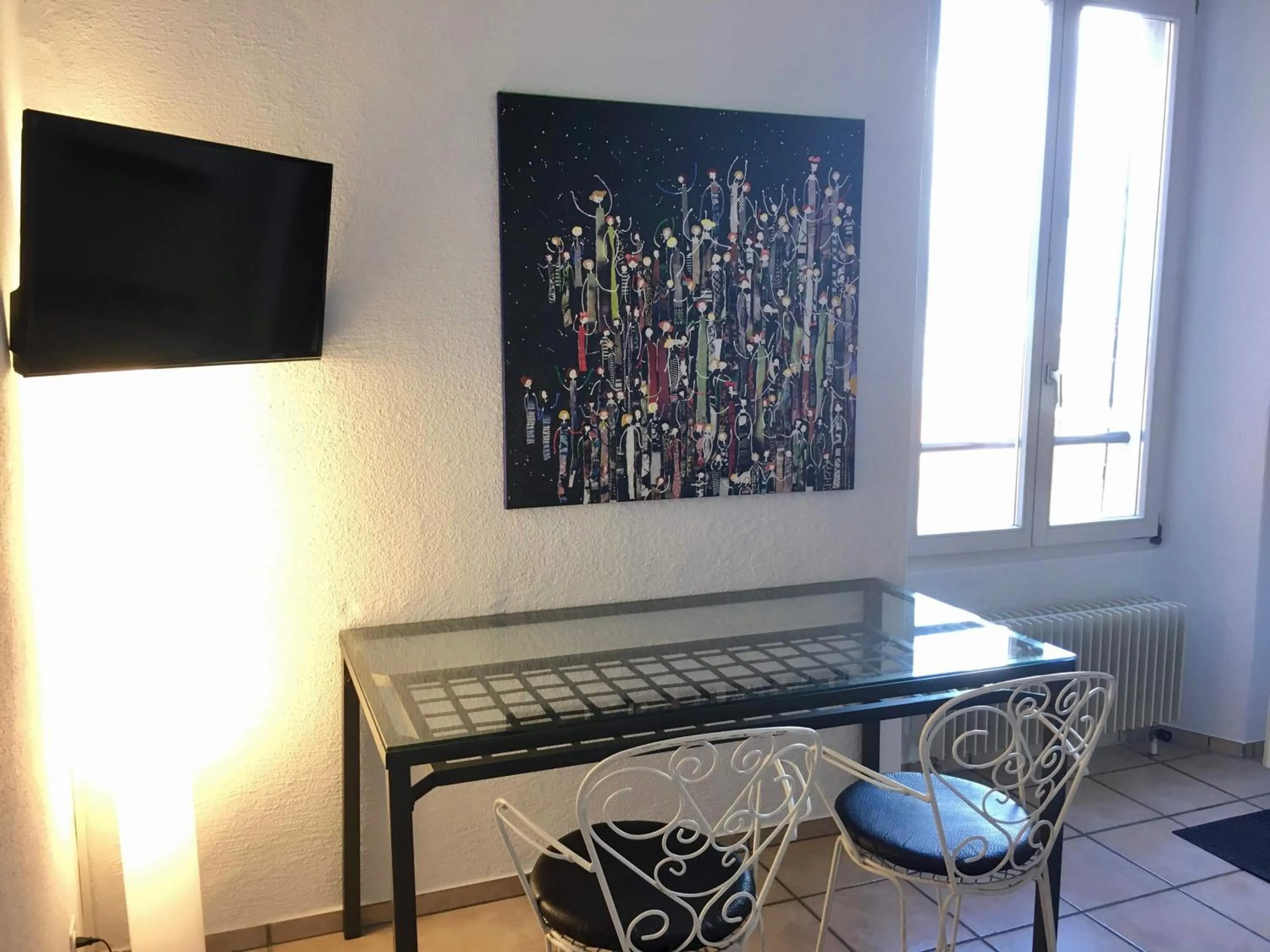 Living room in Great2Stay City Center Apartments Locarno