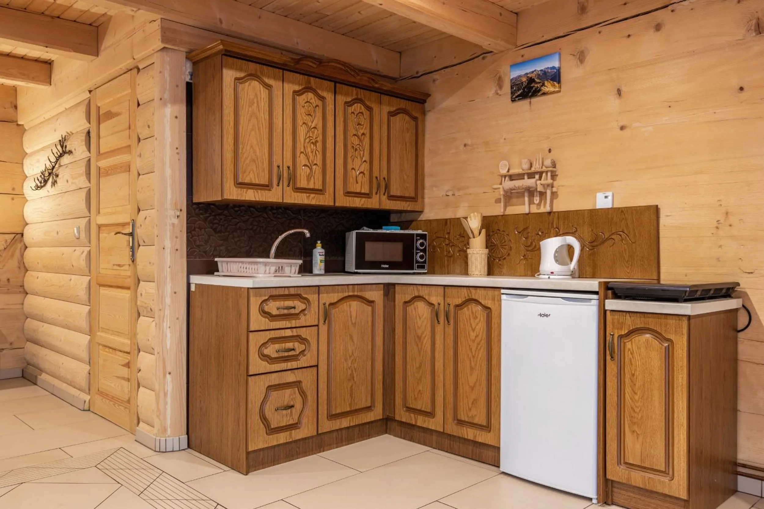 Kitchen or kitchenette in Leśny Dwór