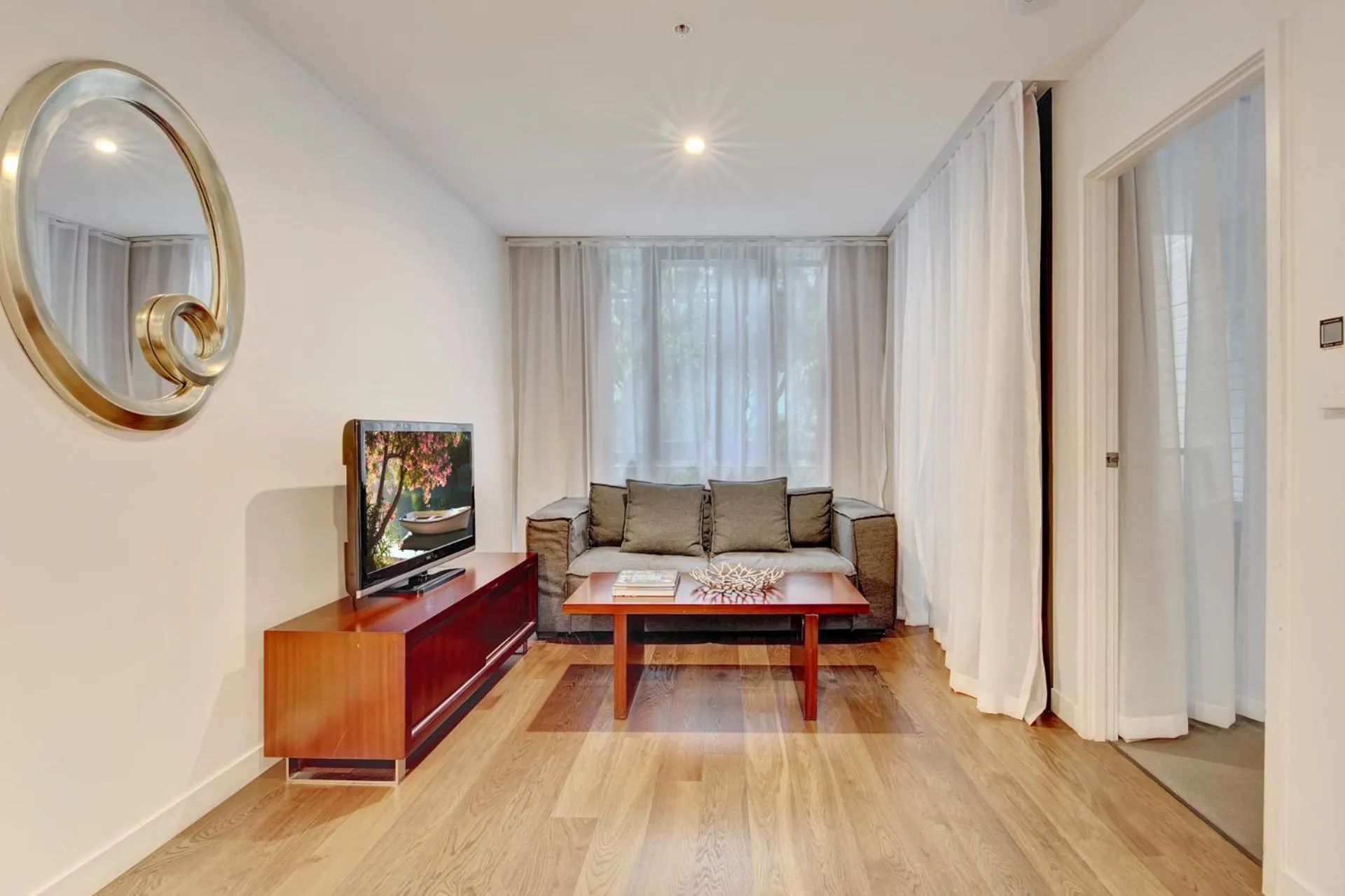 Living room in The Sebel Residences Melbourne Docklands Serviced Apartments