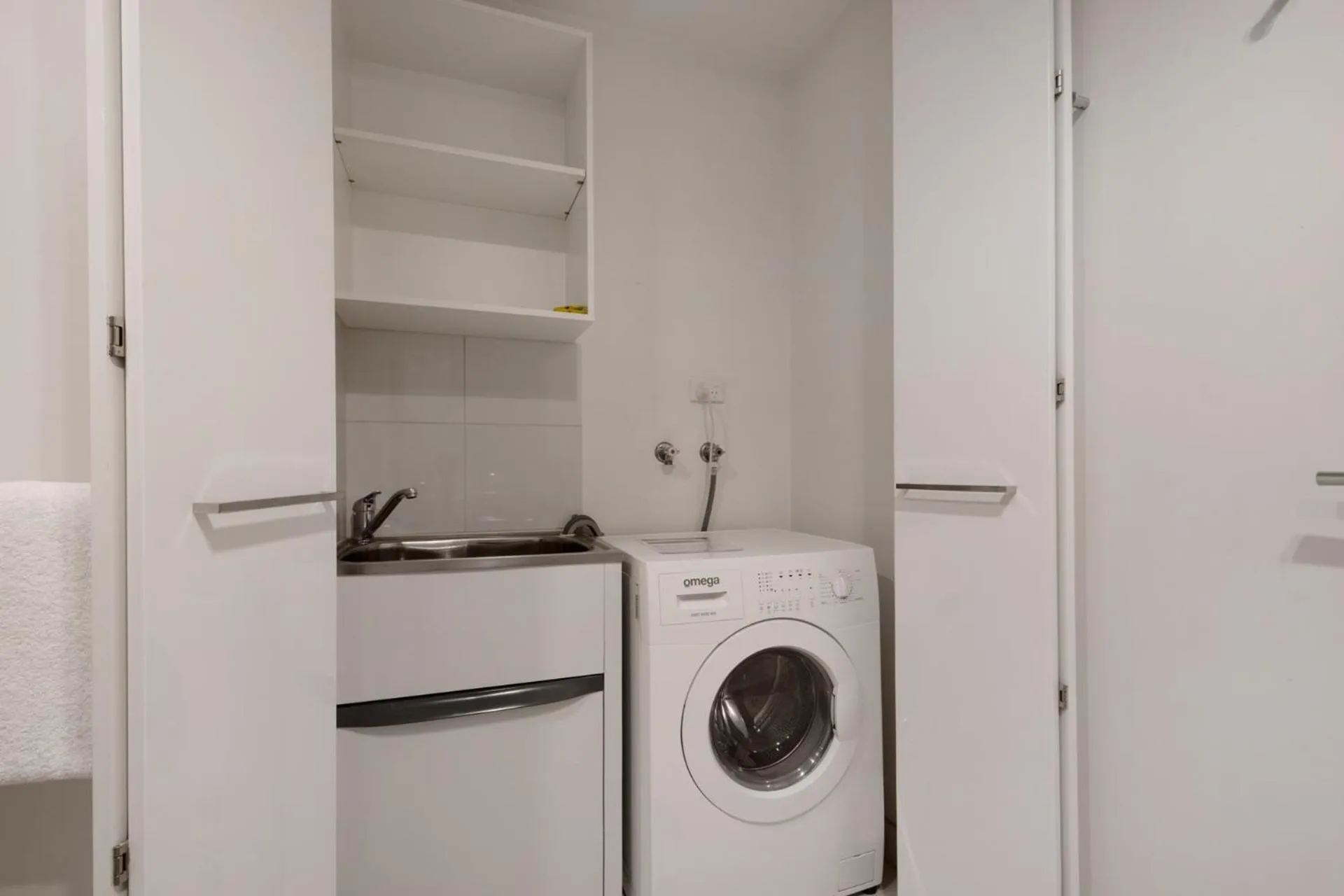 laundry in The Sebel Residences Melbourne Docklands Serviced Apartments