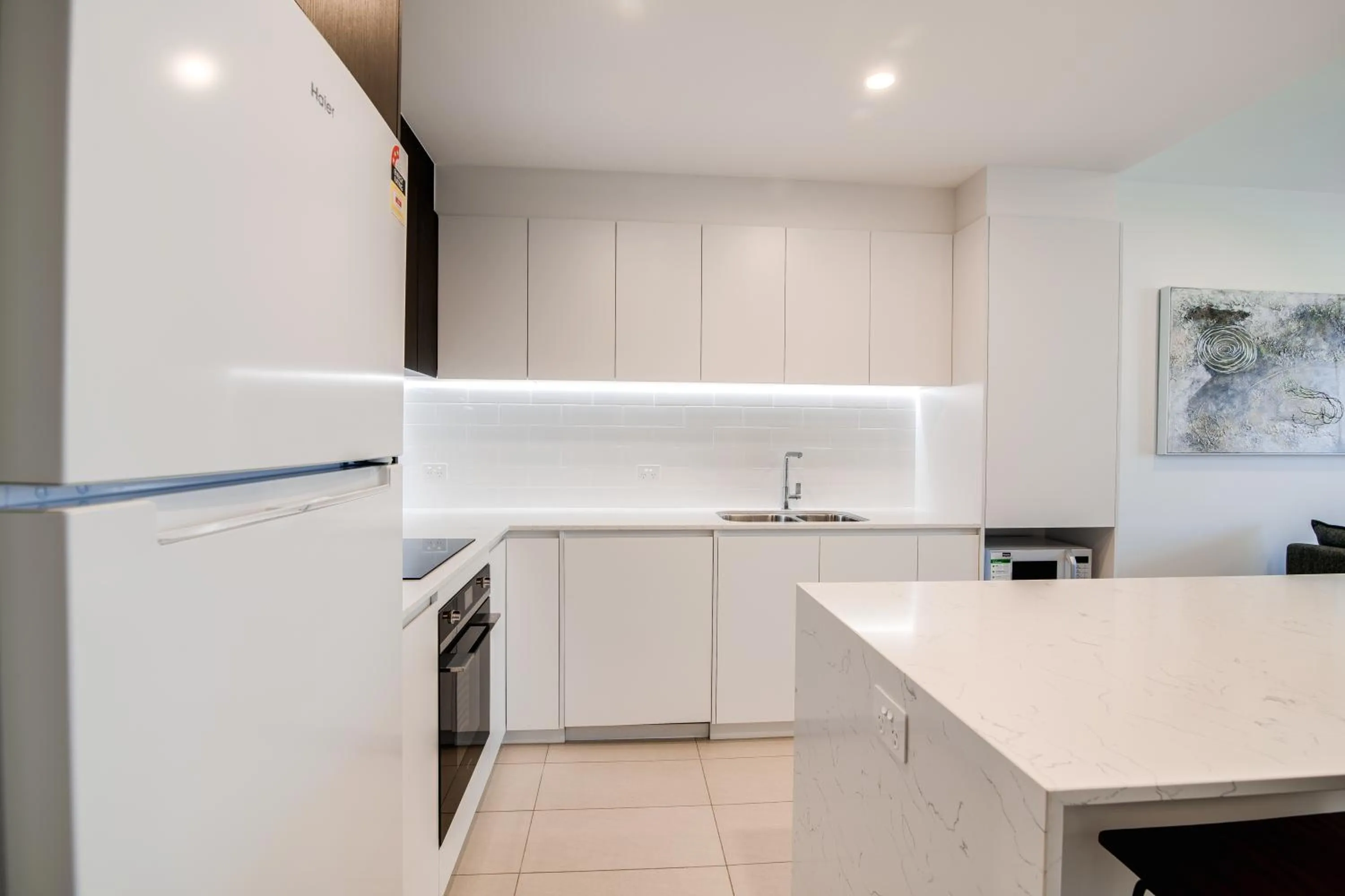 Kitchen or kitchenette in Iconic Kirra Beach Resort