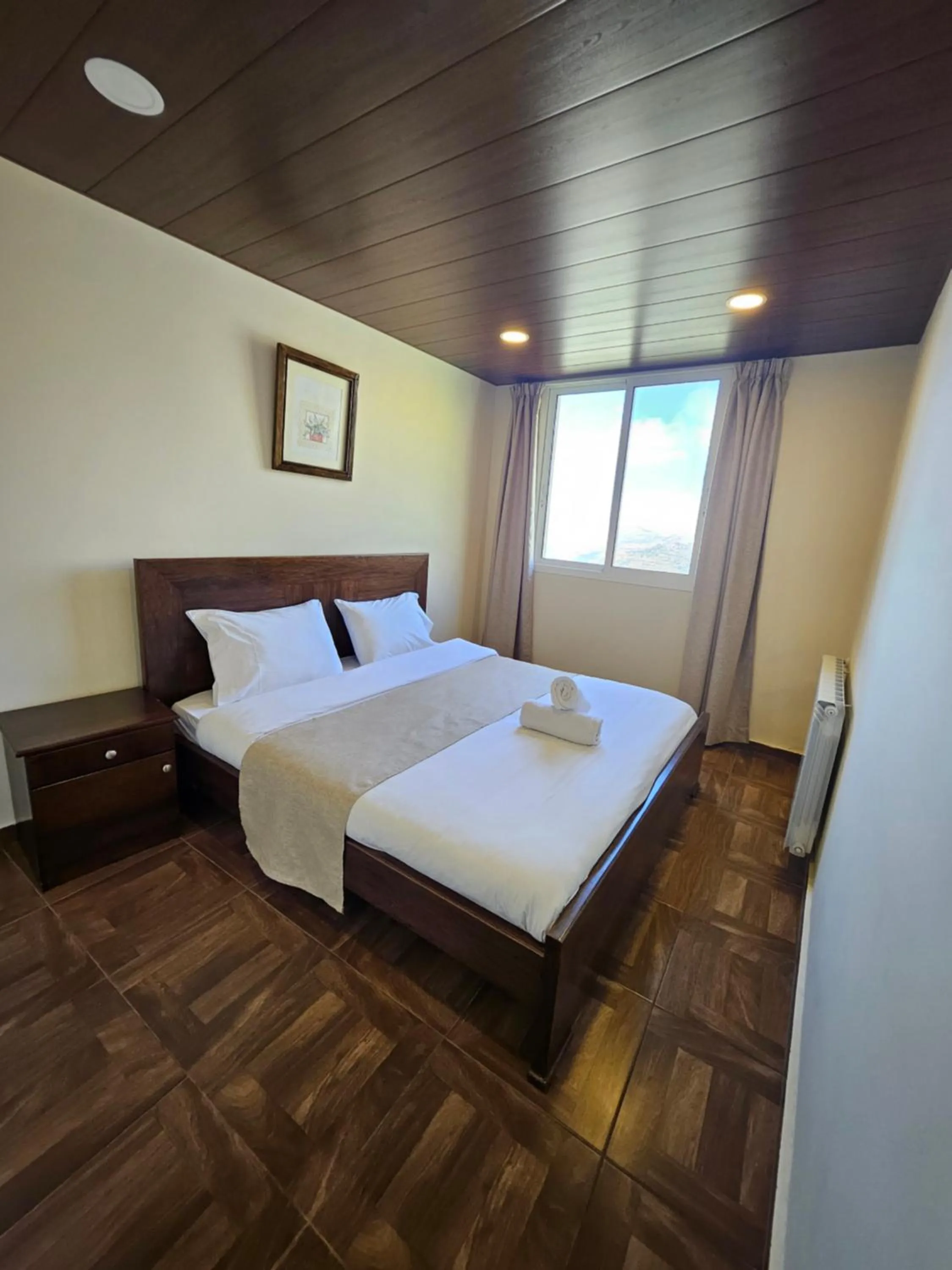 Bed in Hotel L'Aiglon