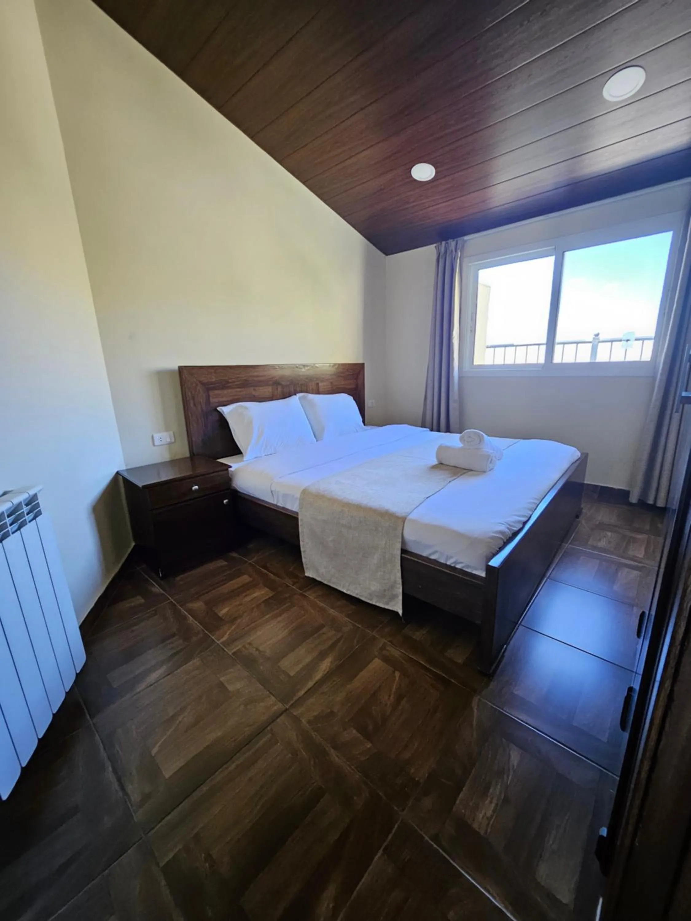 Bed in Hotel L'Aiglon