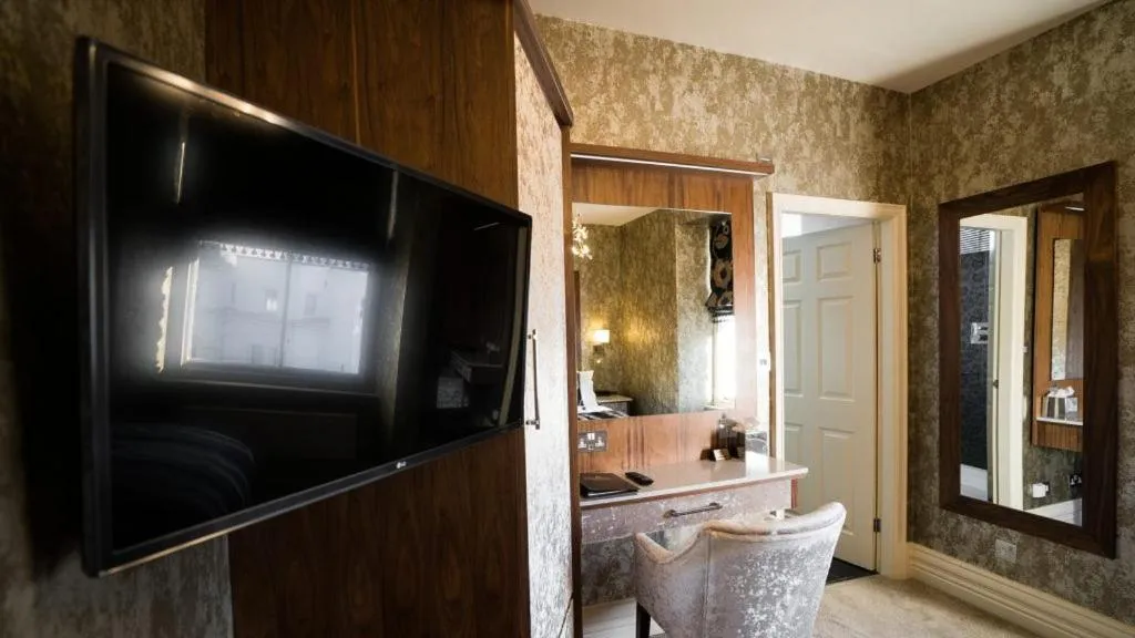 Bedroom in The Cranleigh Boutique