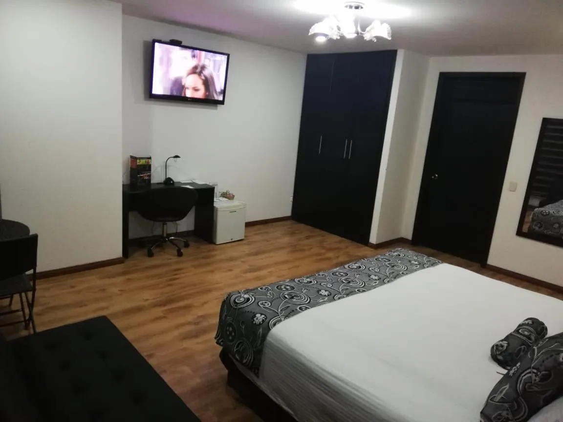 Photo of the whole room, Bed in Hotel Santafe Real