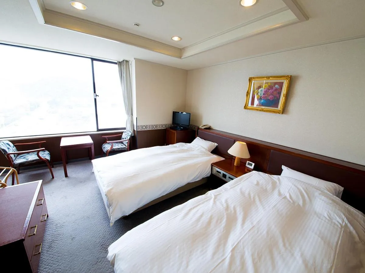 Photo of the whole room, Bed in Naruto Grand Hotel Kaigetsu