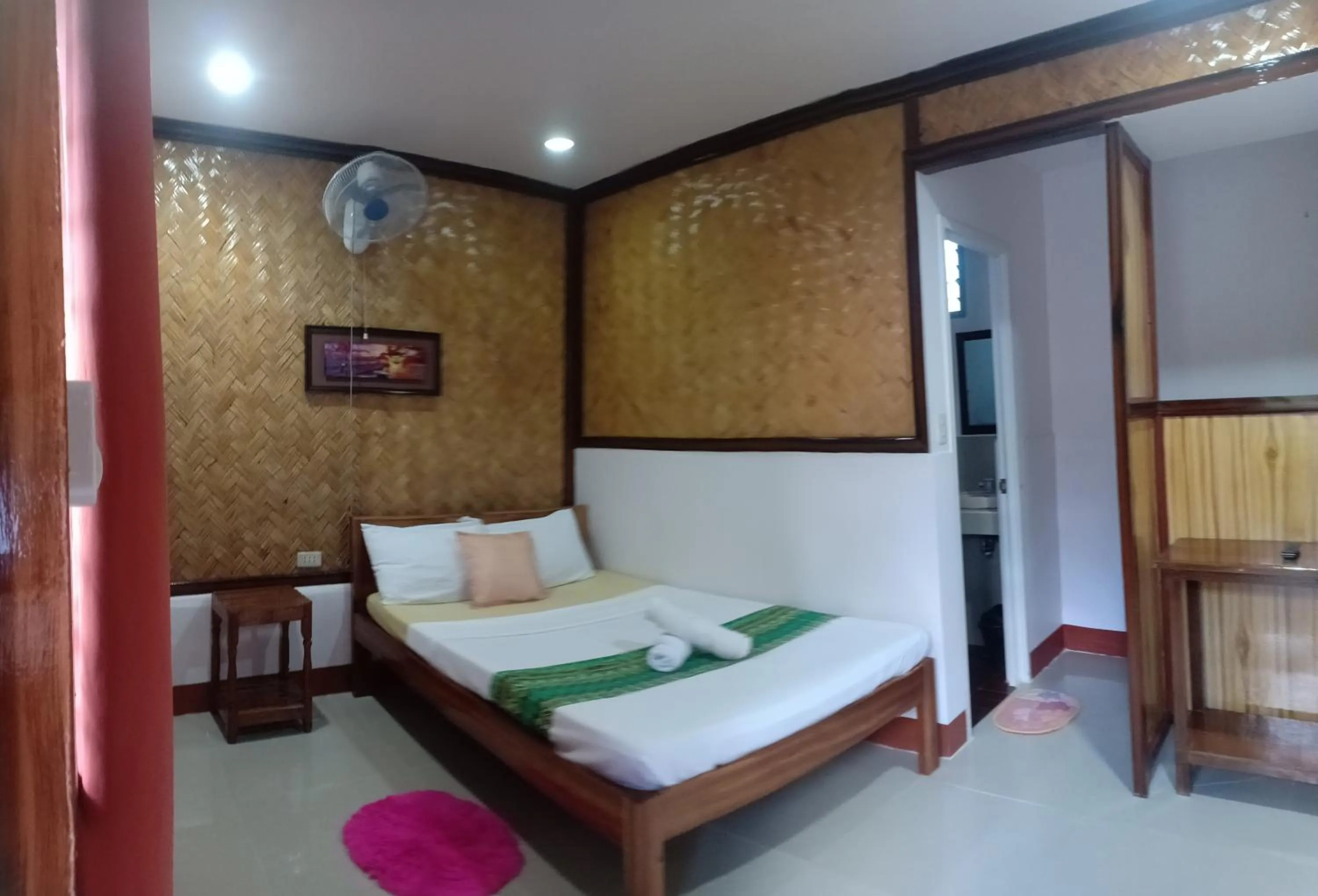 Bed in Telesfora Beach Cottage