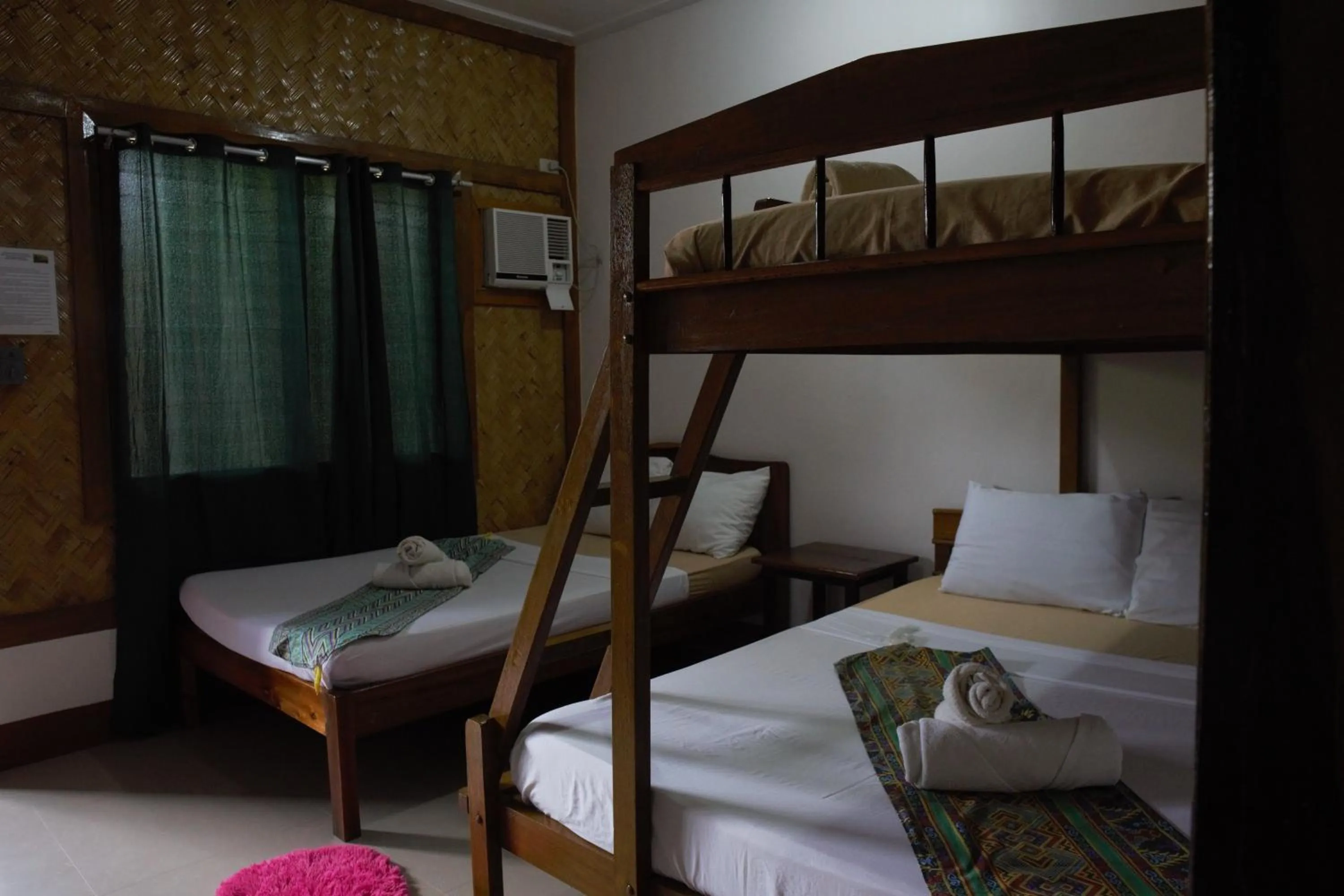 Bed in Telesfora Beach Cottage