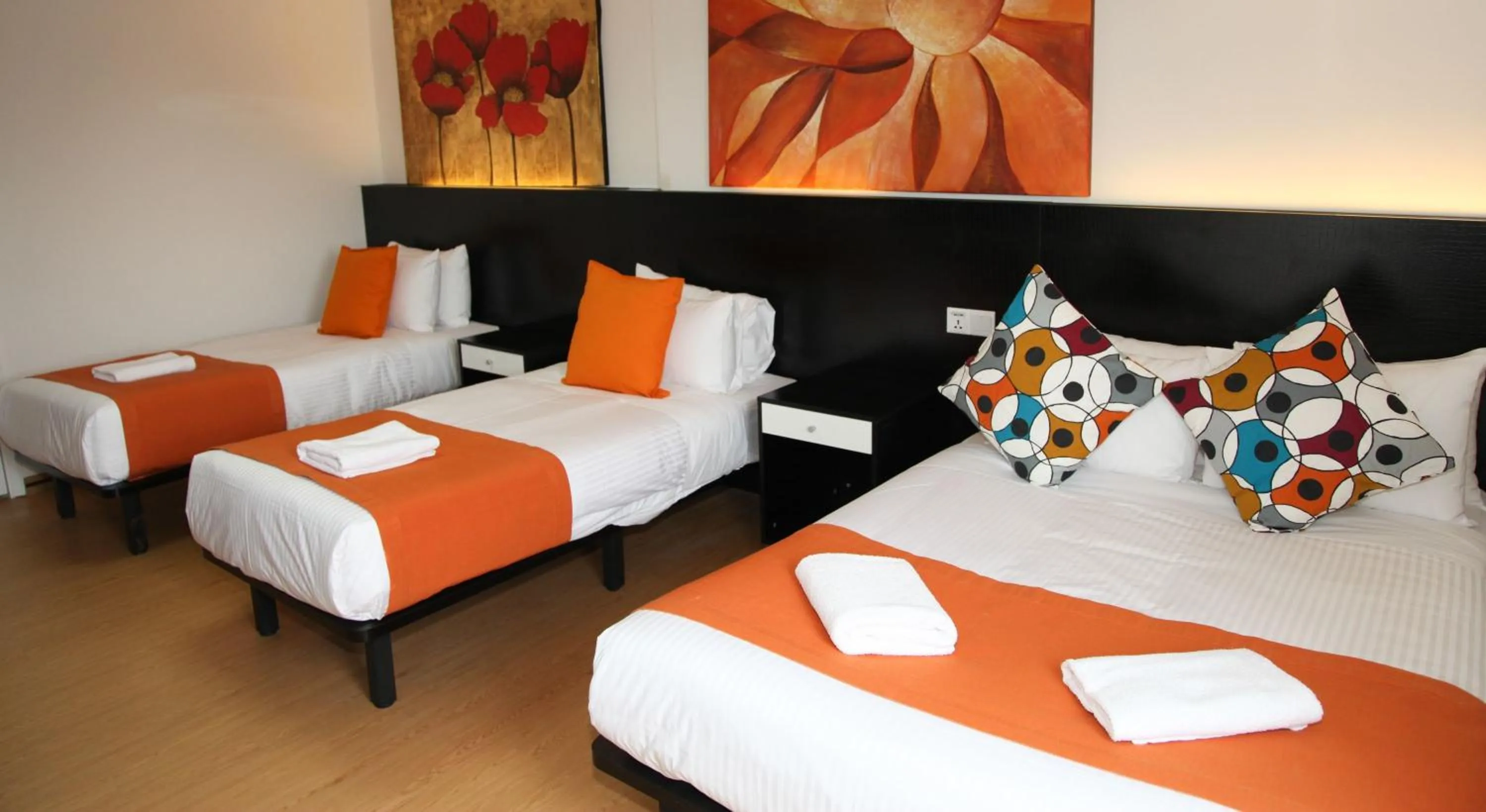 Bed in Heathrow Inn Hotel