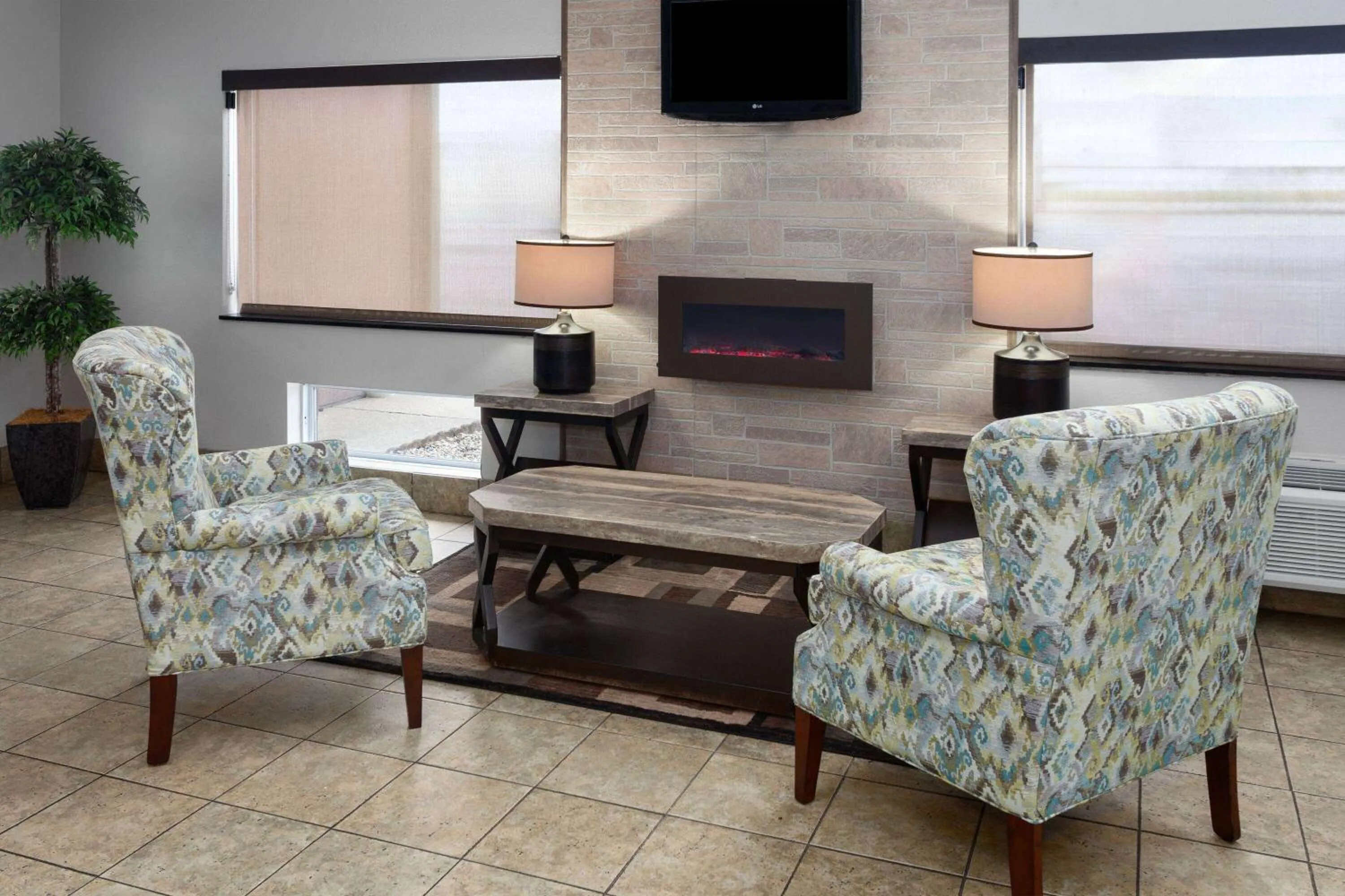 Lobby or reception in Days Inn & Suites by Wyndham Morris I-80