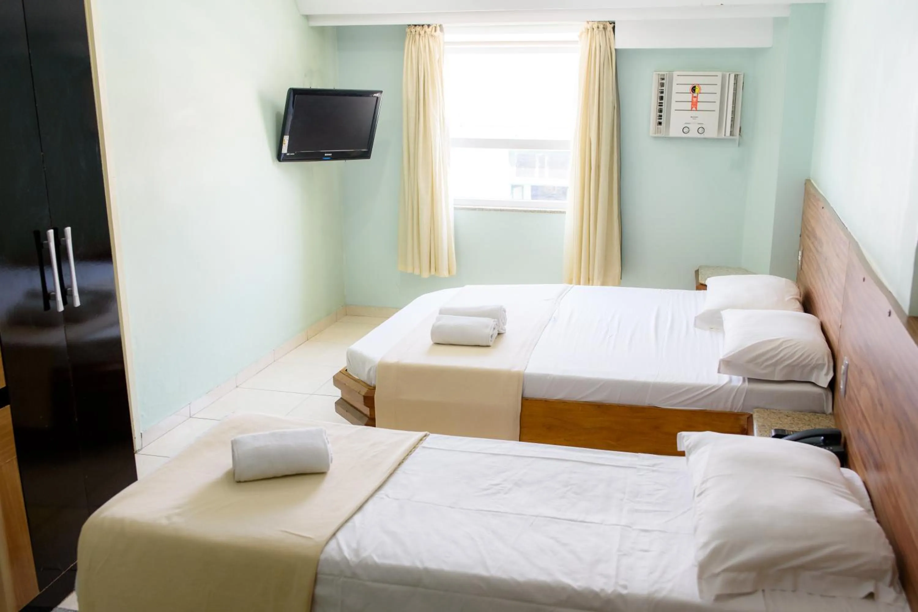 Bed in Gamboa Rio Hotel