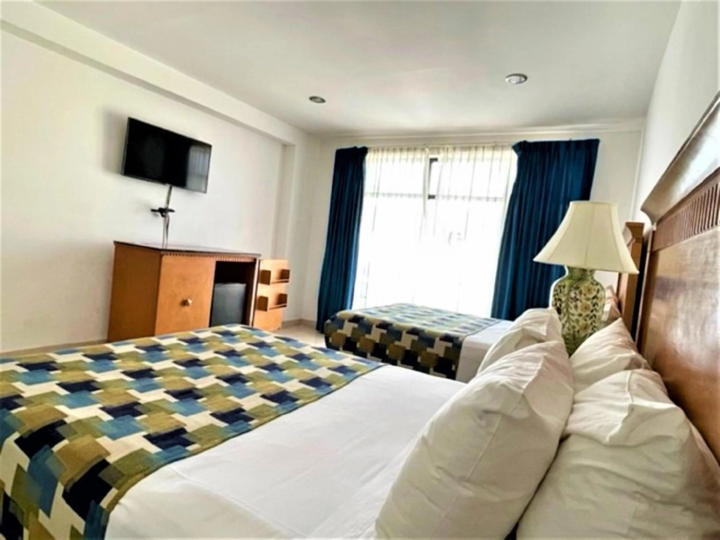 Bed in Hotel Embajadores