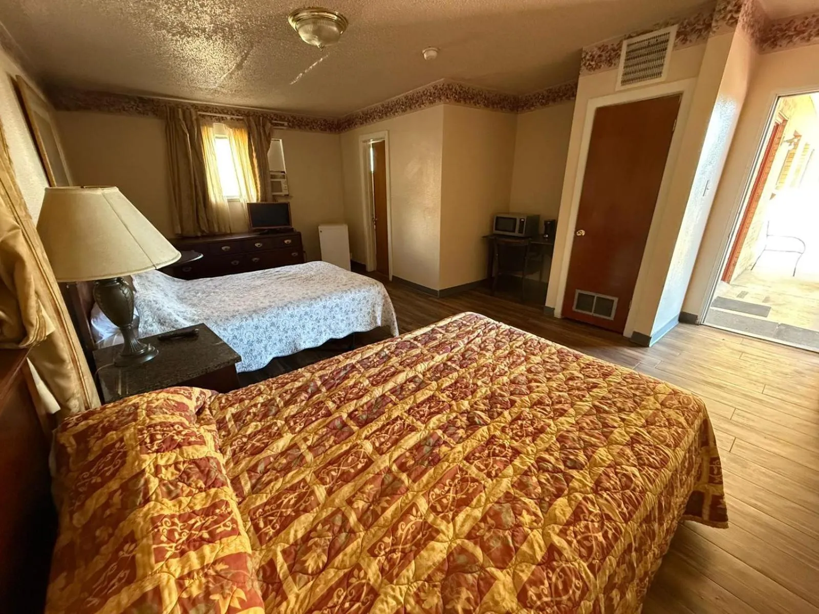 Bedroom, Bed in Springs Inn by Capital O I 25