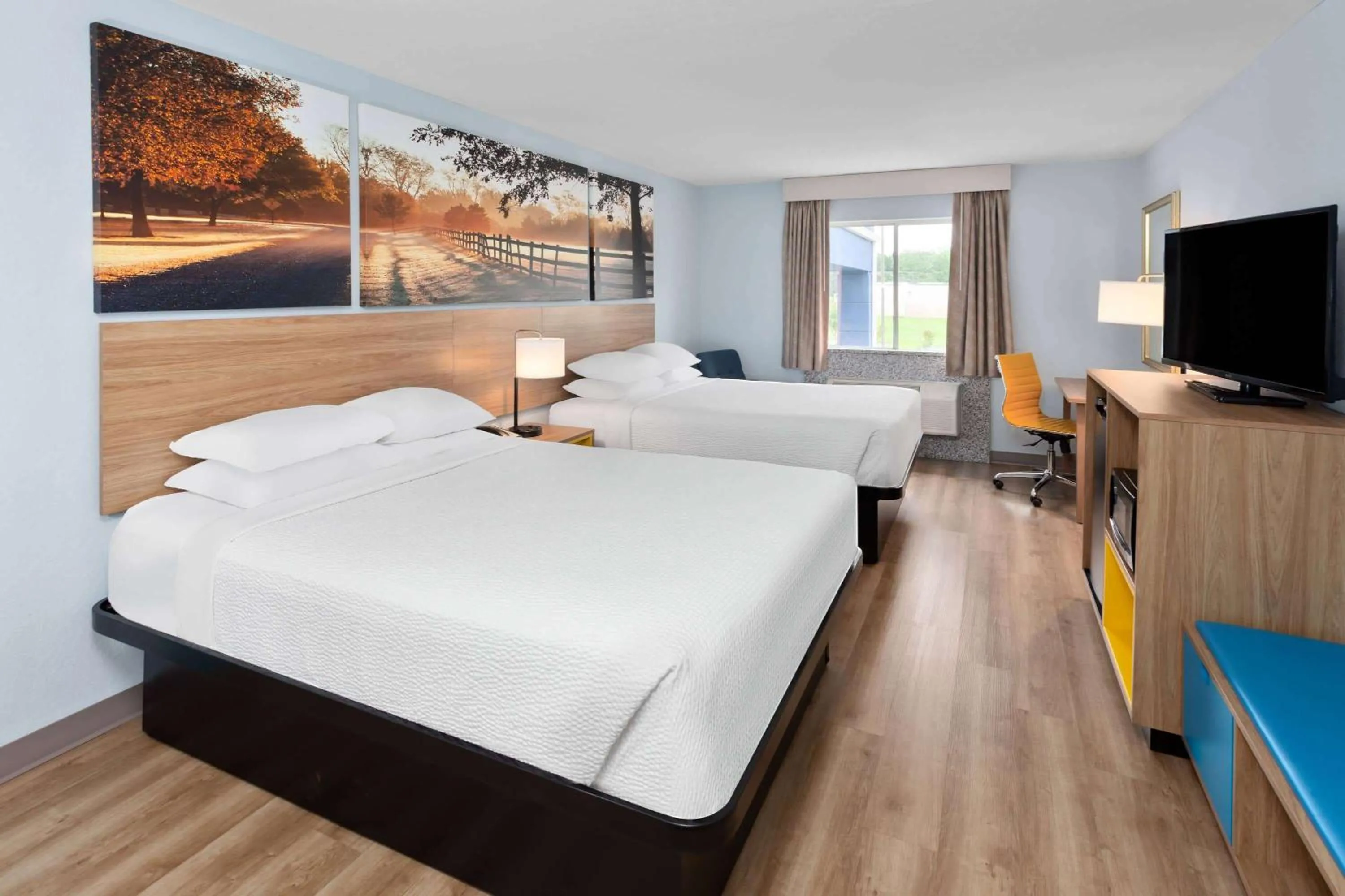 Queen Room with Two Queen Beds - Pet Friendly/Non-Smoking in Days Inn & Suites by Wyndham Siler City