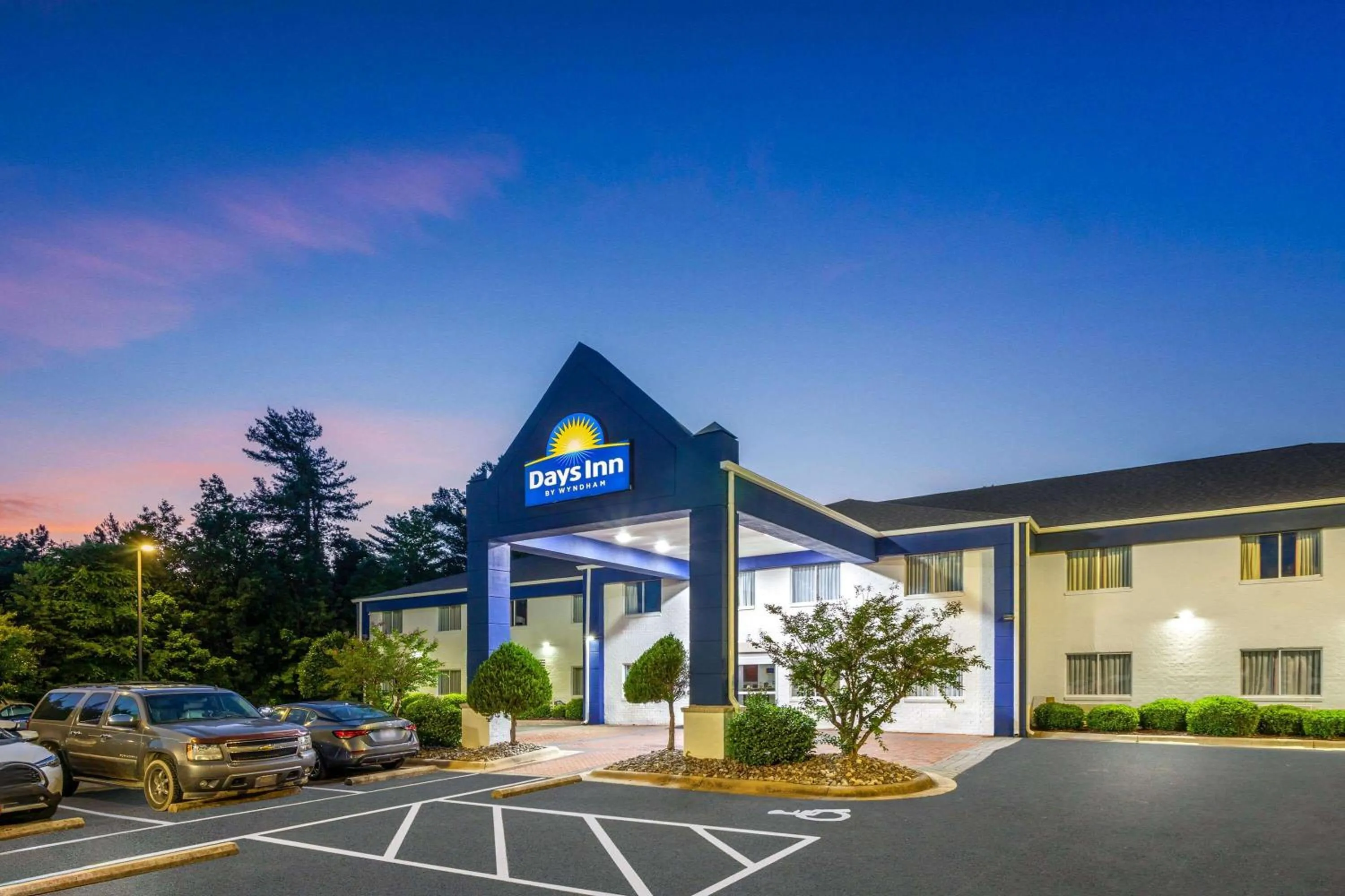 Property building in Days Inn & Suites by Wyndham Siler City
