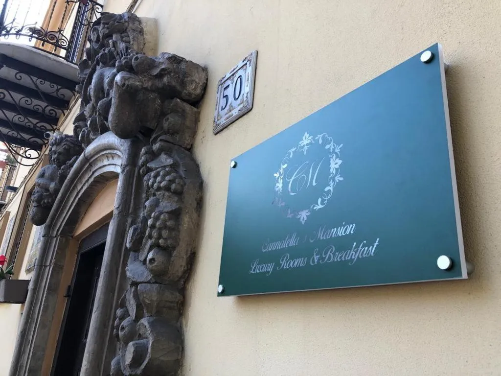 Property logo or sign in Cannatella's Mansion