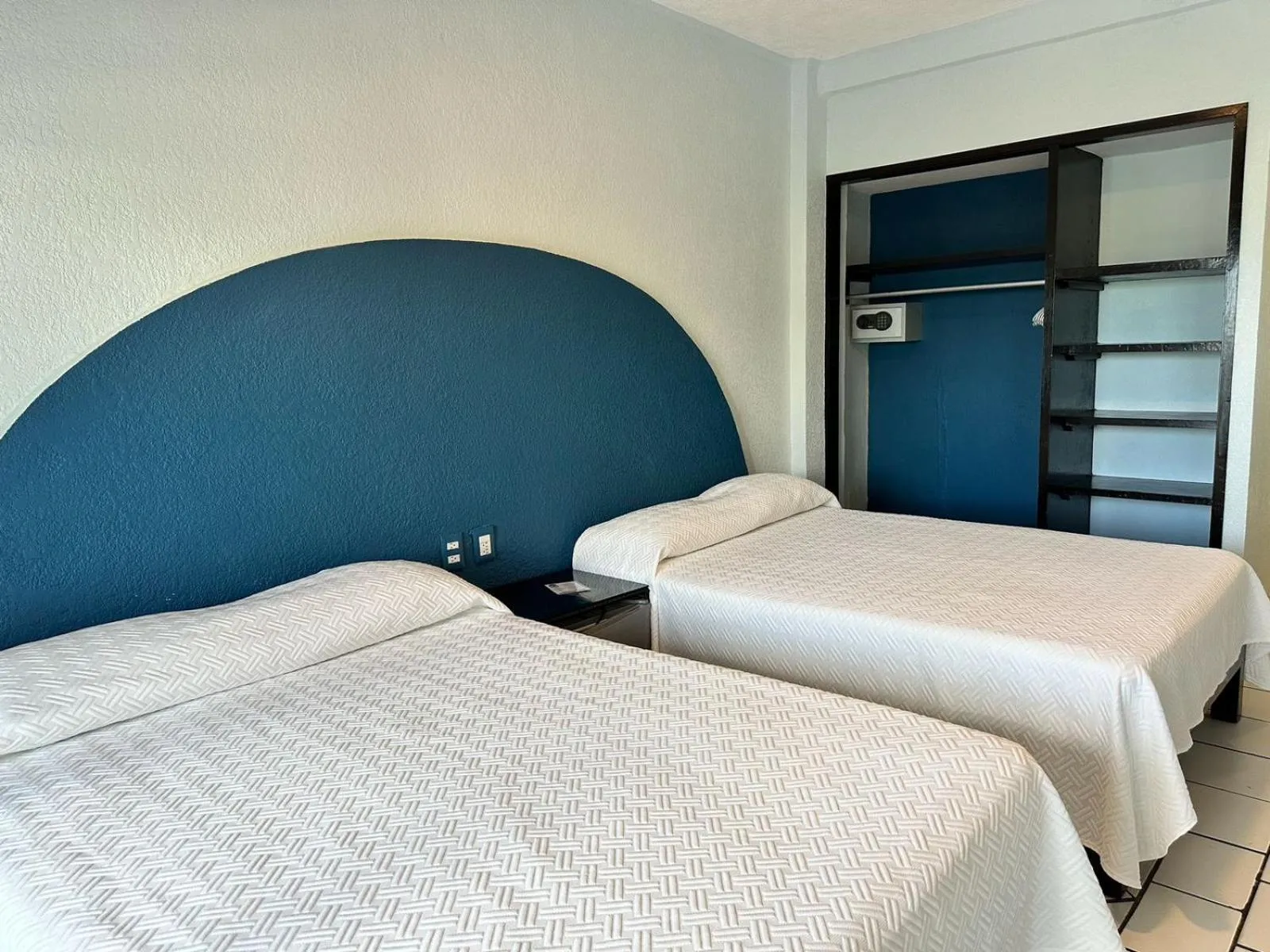 Bed in Acamar Beach Resort