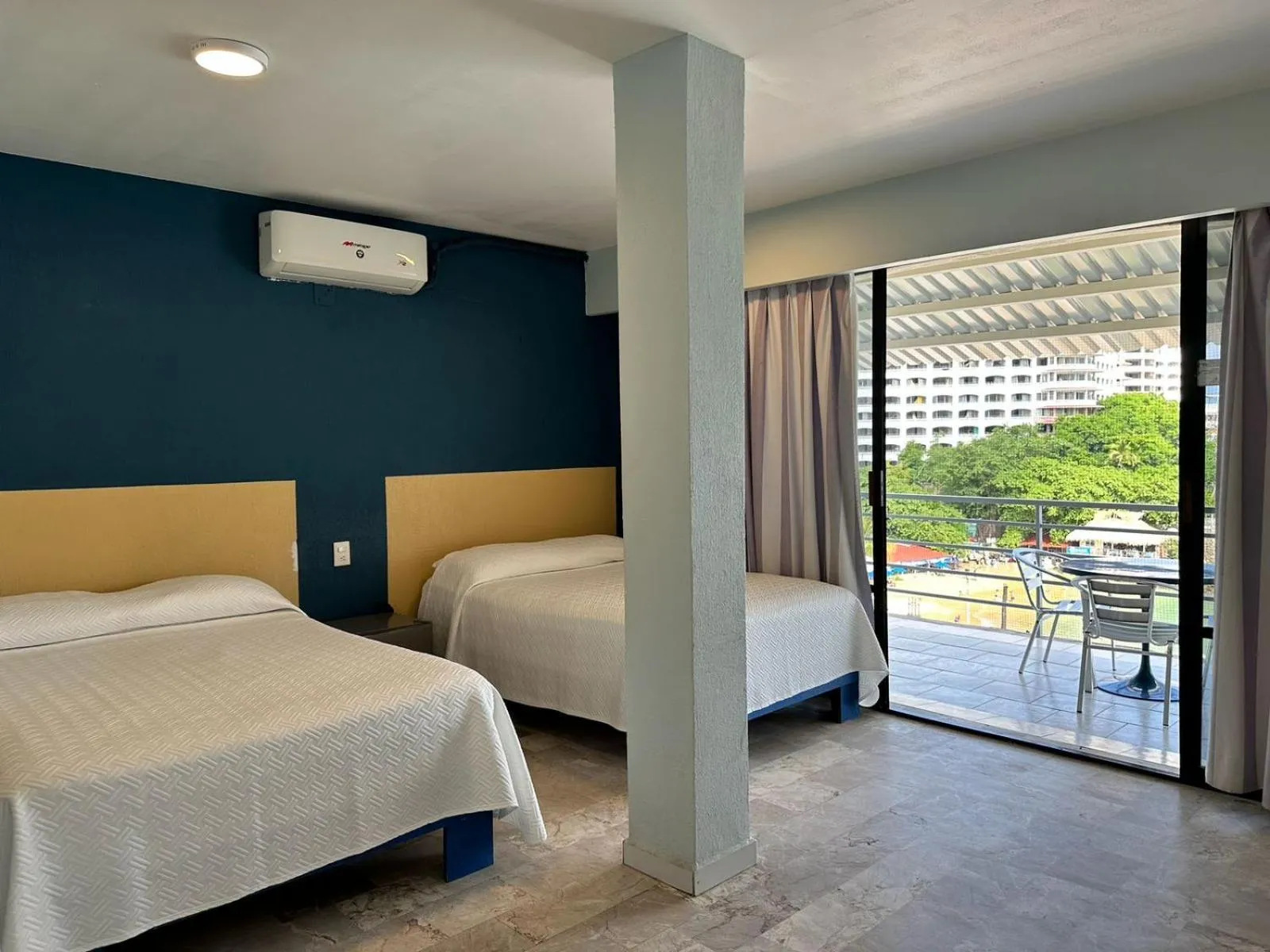 Bed in Acamar Beach Resort