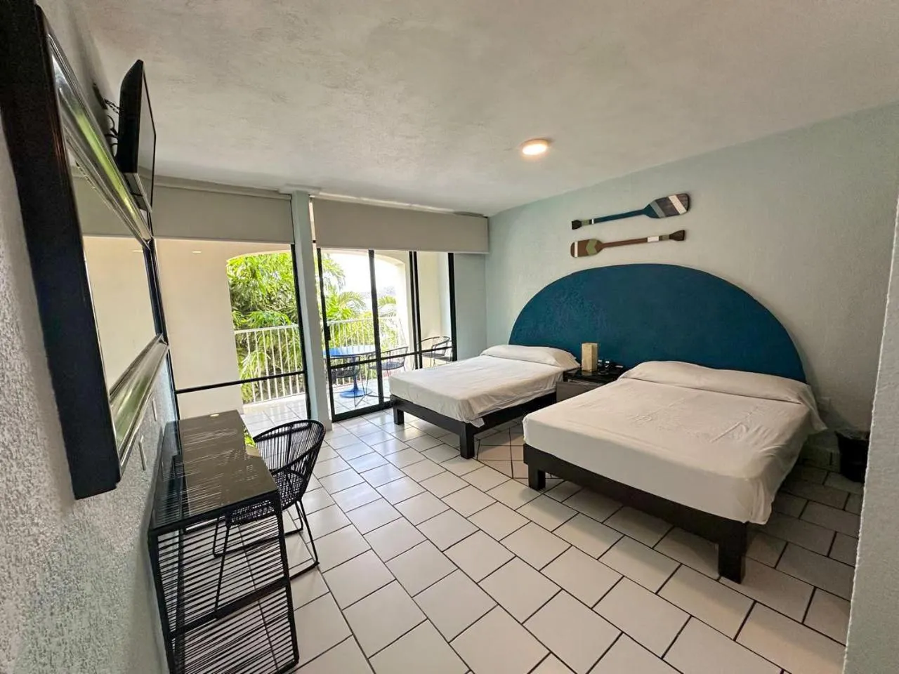 Bed in Acamar Beach Resort