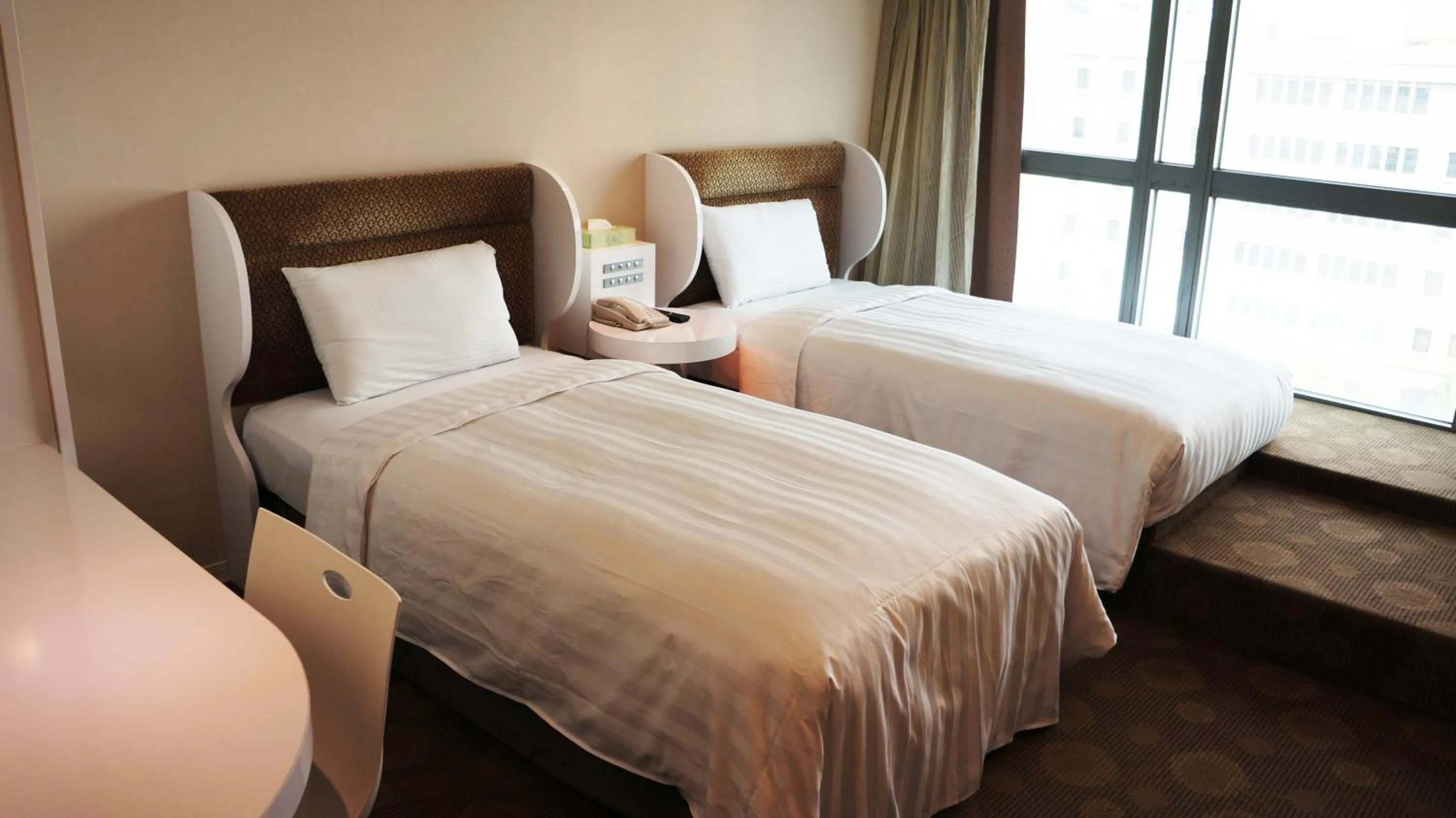 Bed in Ximen Airline Hotel